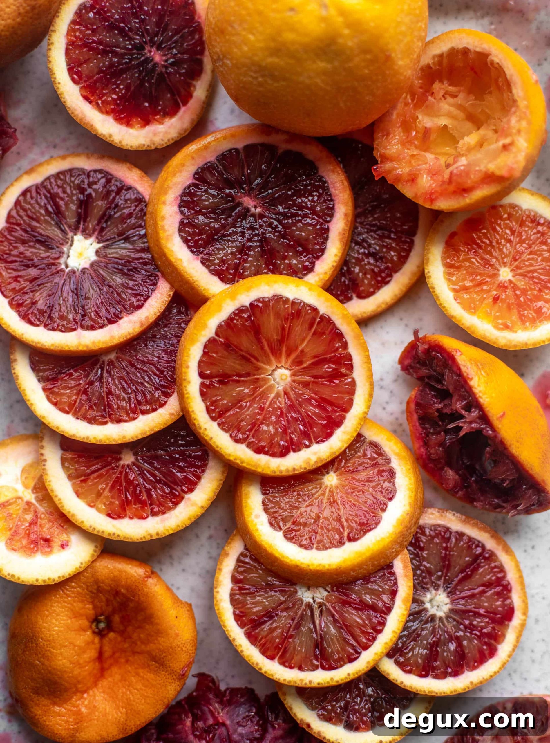 Blood Orange Aperol Spritz Recipe — Sparkling Citrus Cocktail 3 sliced blood oranges