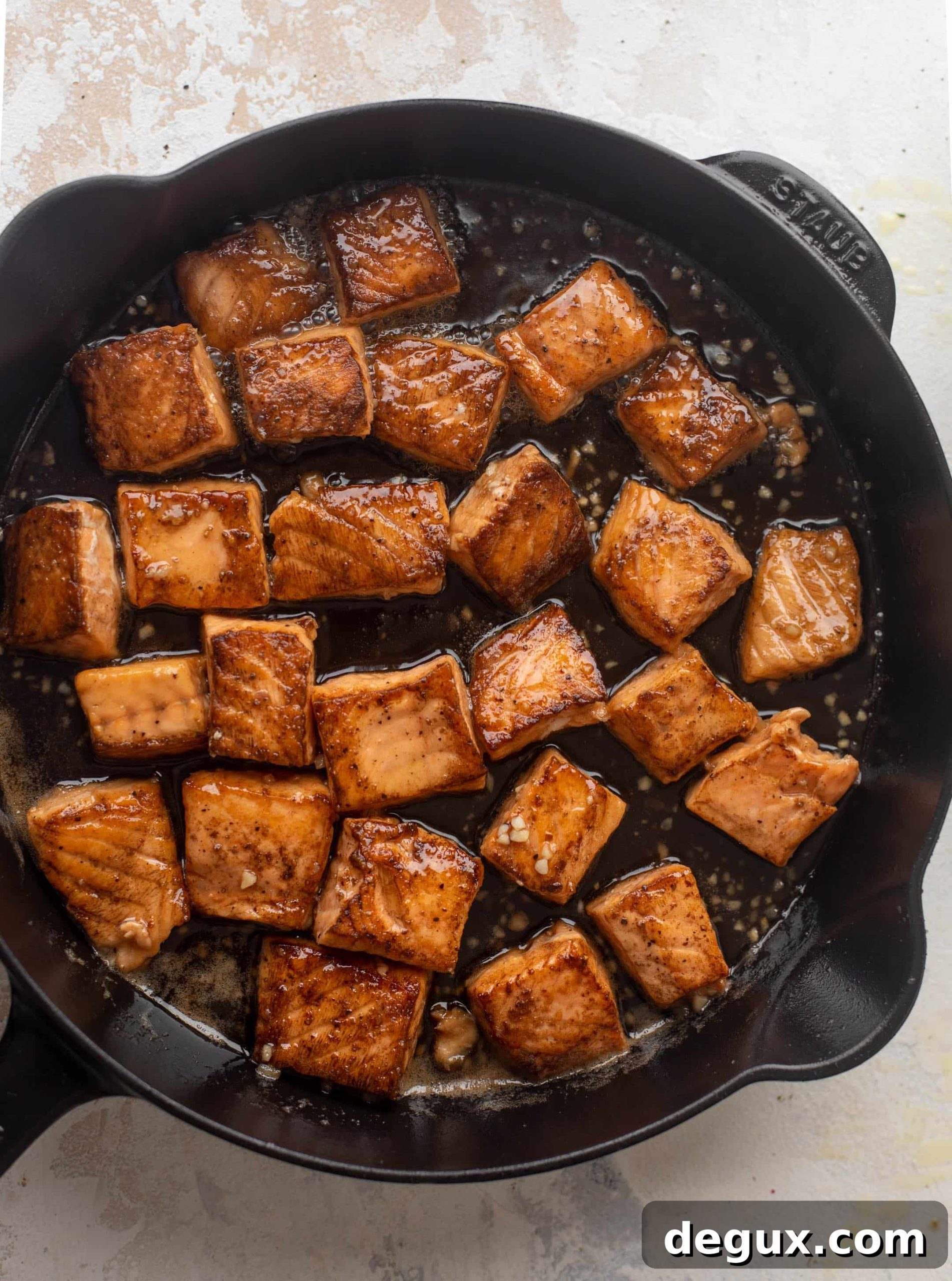 Sticky Salmon Couscous Bowls with Tangy Soy Glaze 5 sticky cast iron salmon