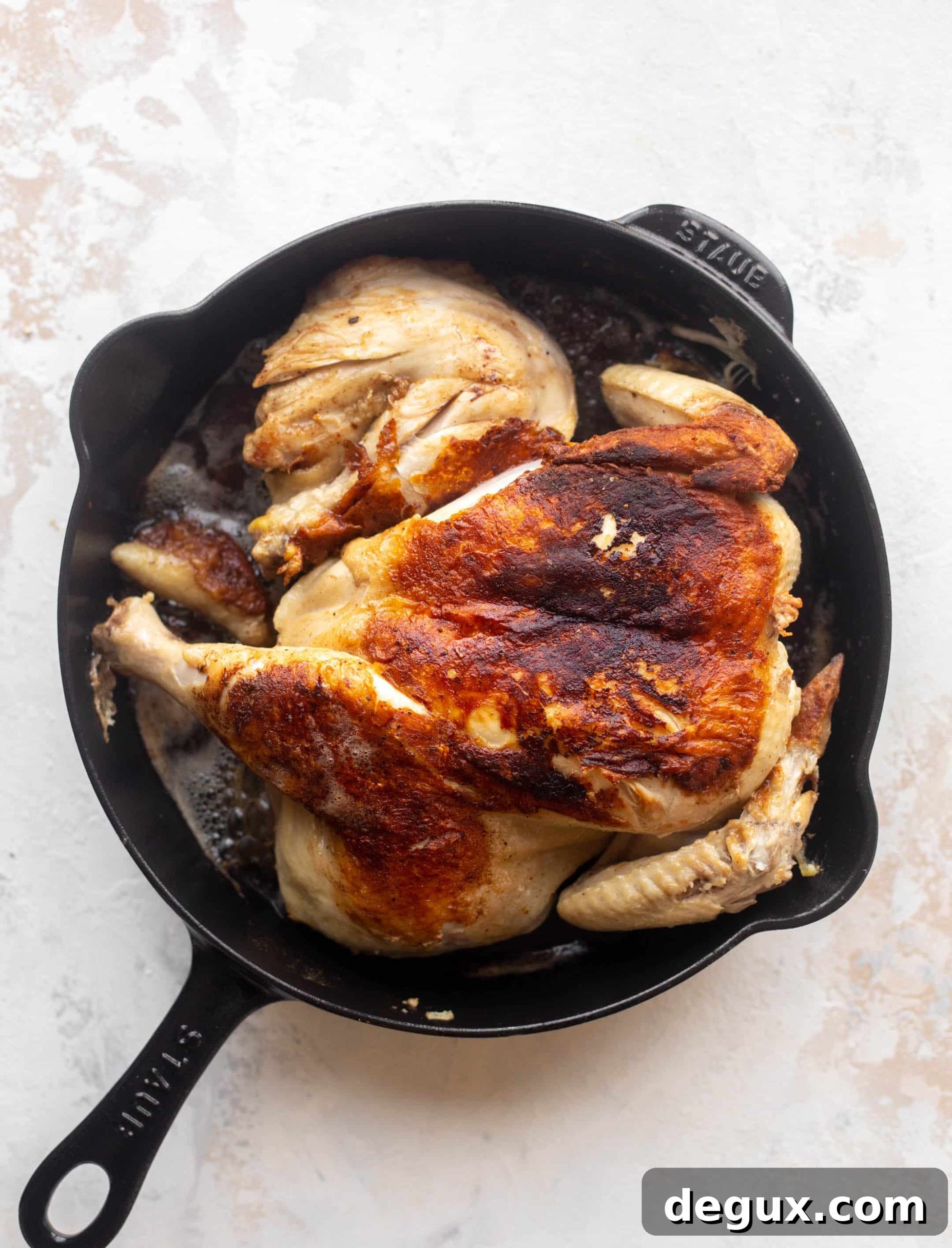 Spring Chicken Smothered in Herbs with Smashed Potatoes 3 cast iron spatchcock chicken