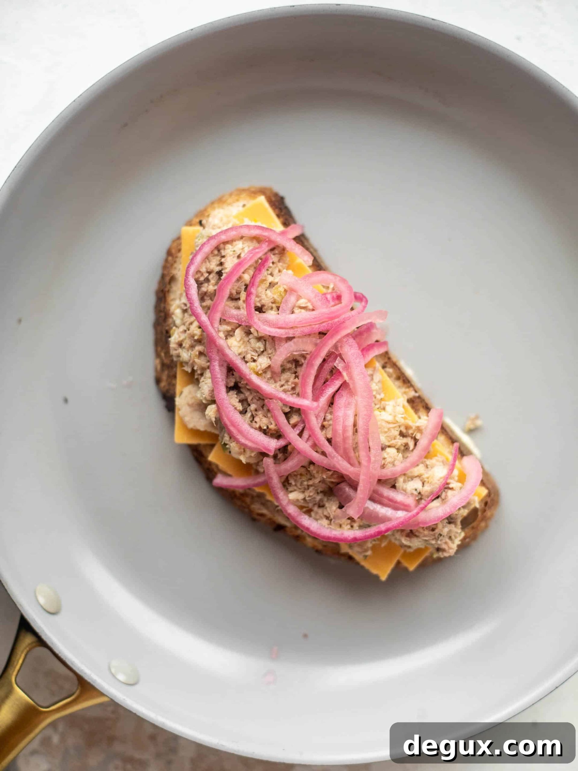 sharp cheddar tuna melts