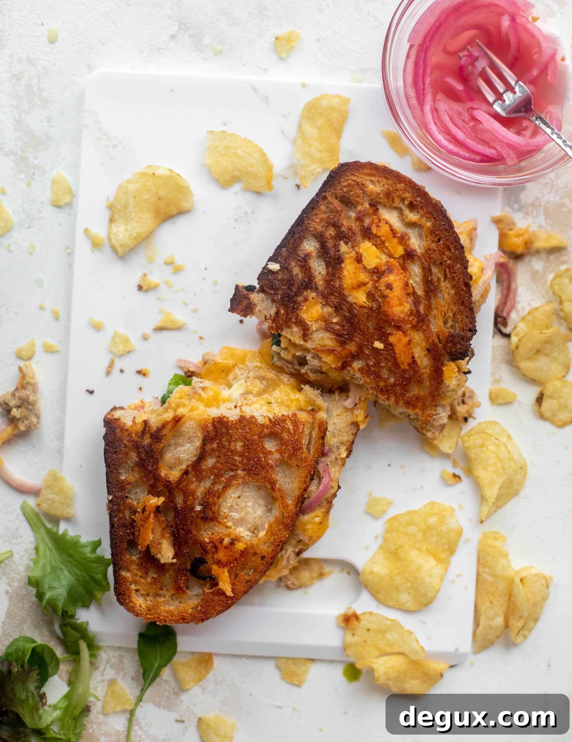 sharp cheddar tuna melts
