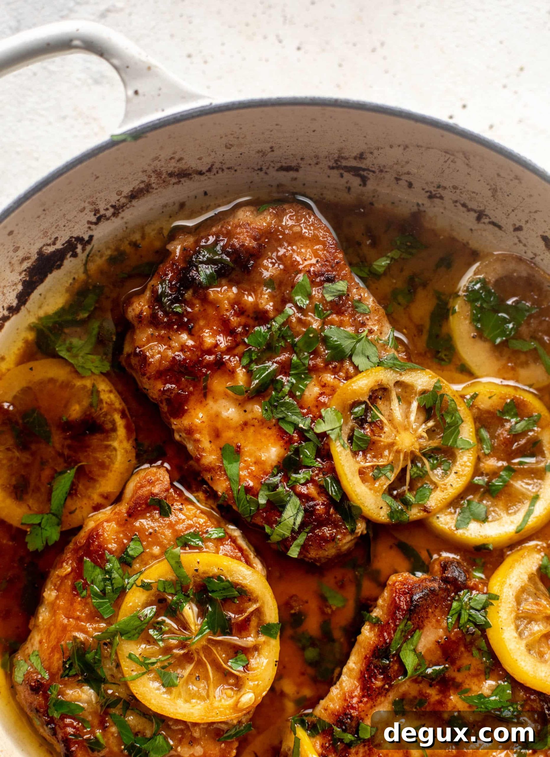 Juicy Lemon-Butter Pork Chops with Garlic and Herbs 5 lemon butter pork chops