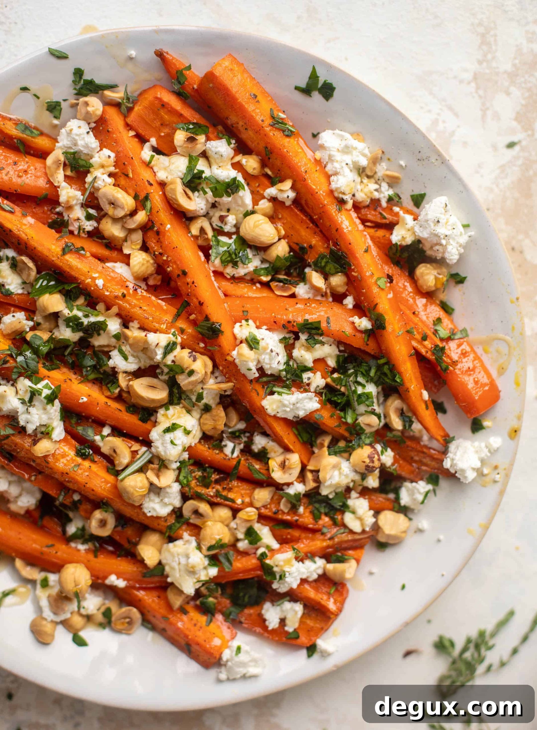 Maple-Roasted Carrots with Hazelnuts and Goat Cheese 8 Plated maple roasted carrots
