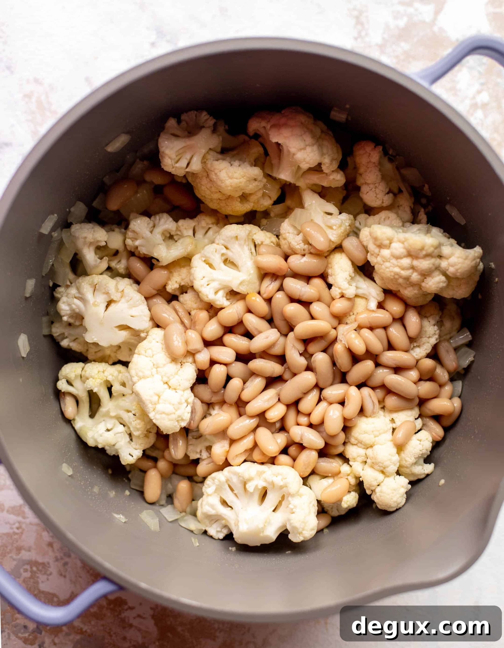 Creamy Cauliflower and White Bean Soup with Mustard Croutons 4 cauliflower white bean soup with mustardy croutons