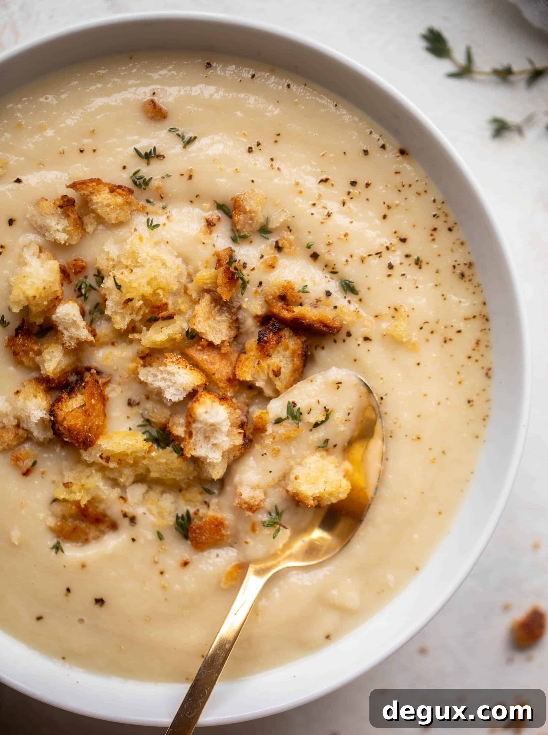 Creamy Cauliflower and White Bean Soup with Mustard Croutons 10 cauliflower white bean soup with mustardy croutons