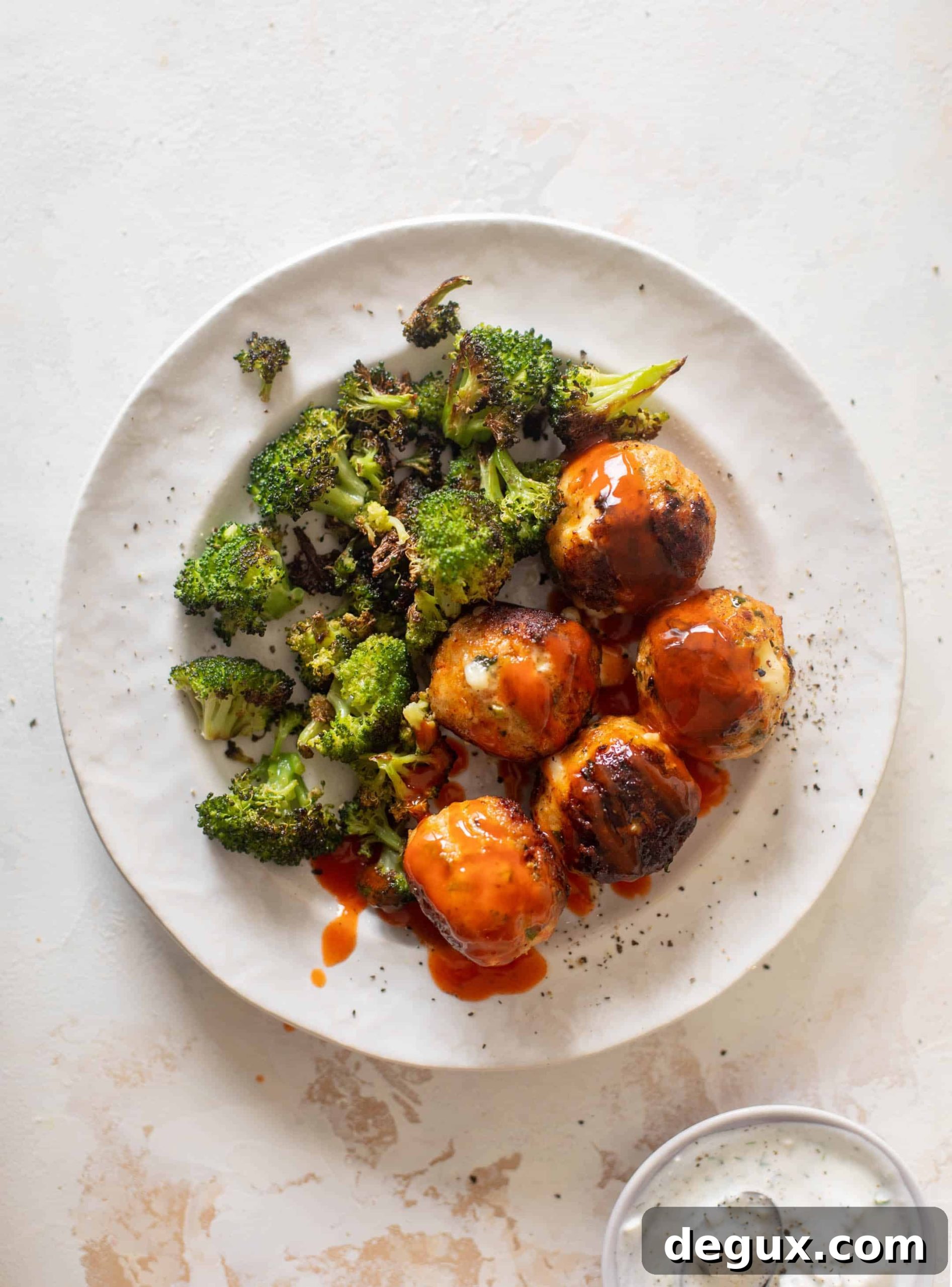 Sheet Pan Buffalo Chicken Meatballs with Roasted Broccoli 9 sheet pan buffalo chicken meatballs & broccoli