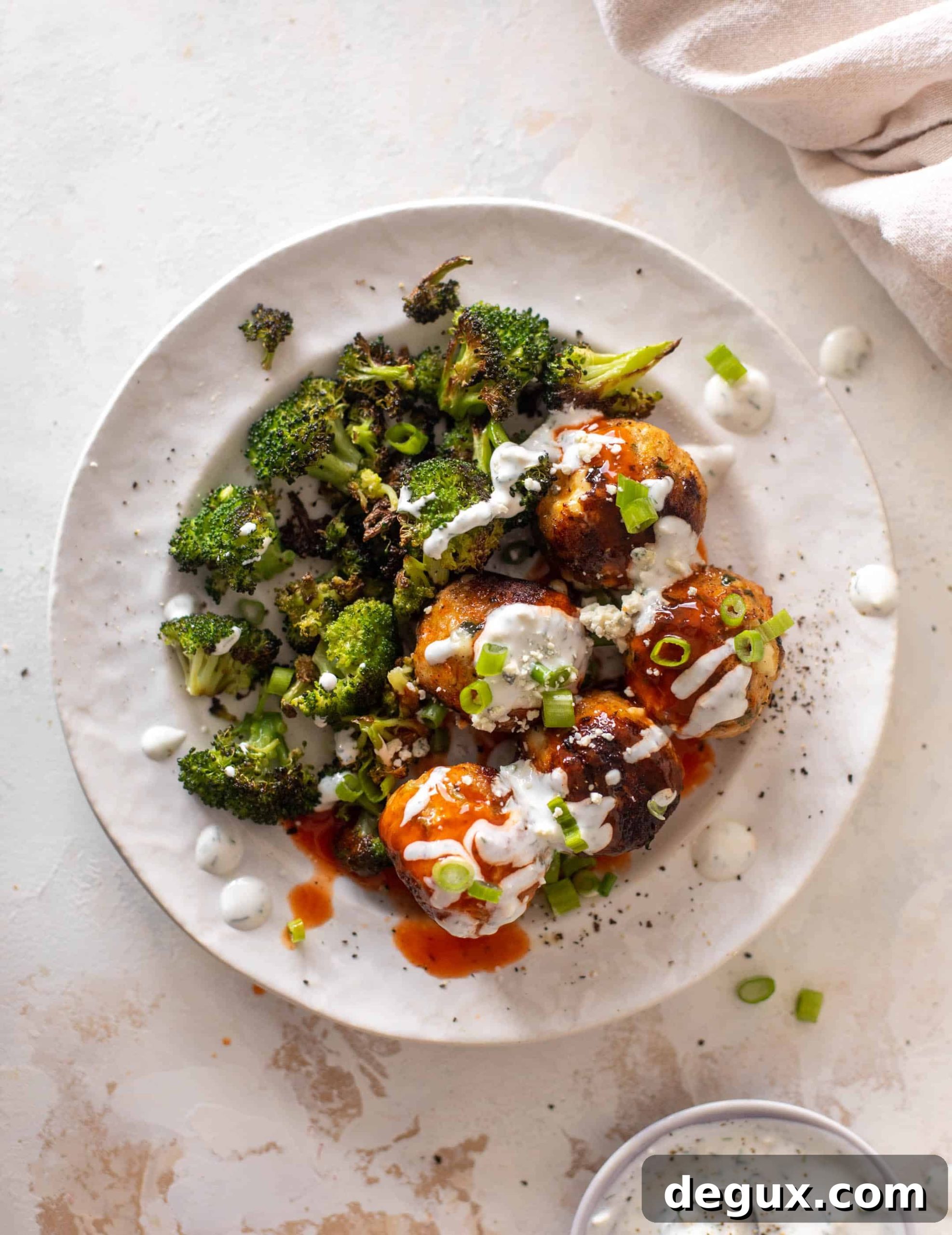 Sheet Pan Buffalo Chicken Meatballs with Roasted Broccoli 10 sheet pan buffalo chicken meatballs & broccoli