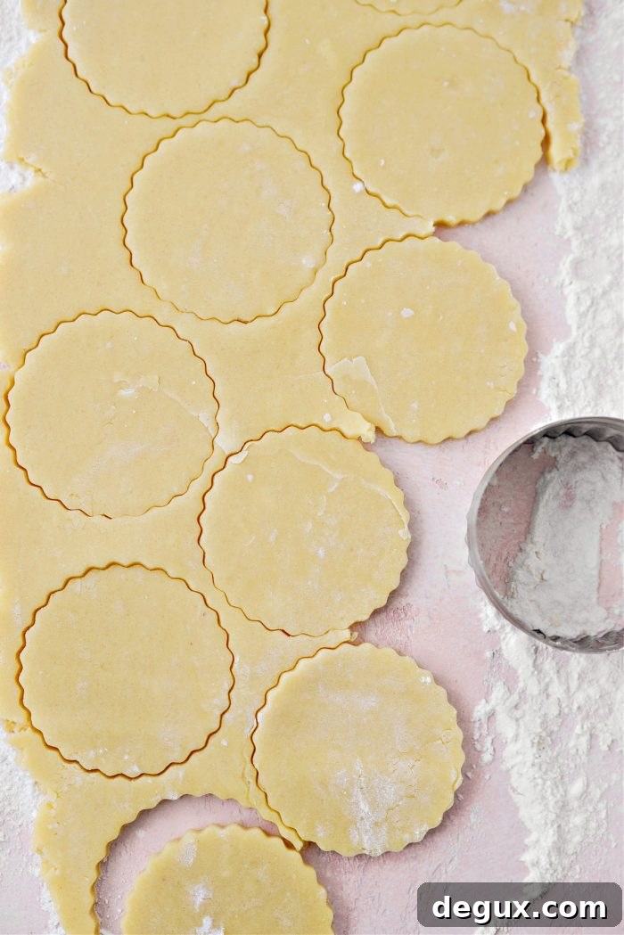 stamp out cookies with round biscuit or cookie cutter