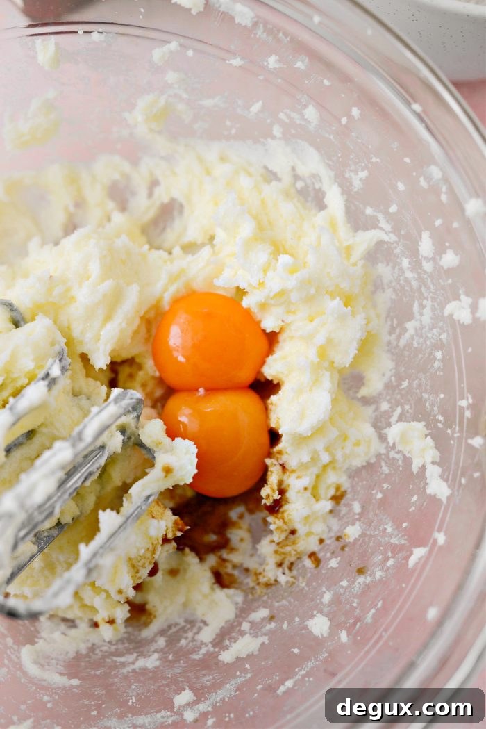 Add in egg yolks