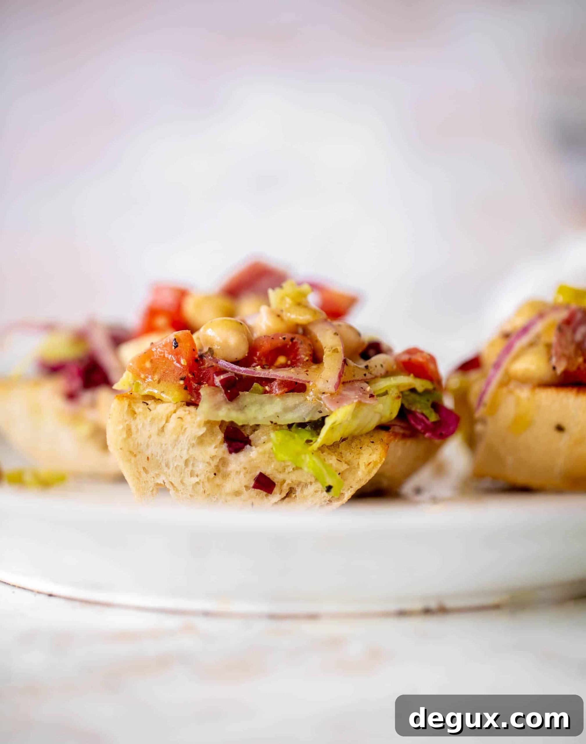 italian chopped salad on garlic bread