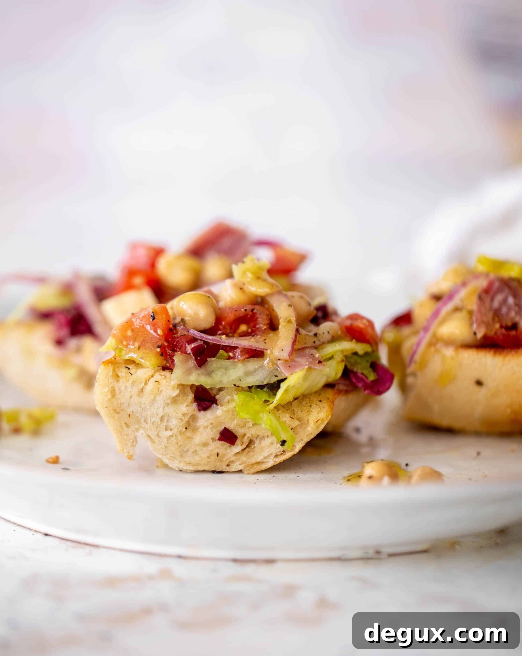 italian chopped salad on garlic bread
