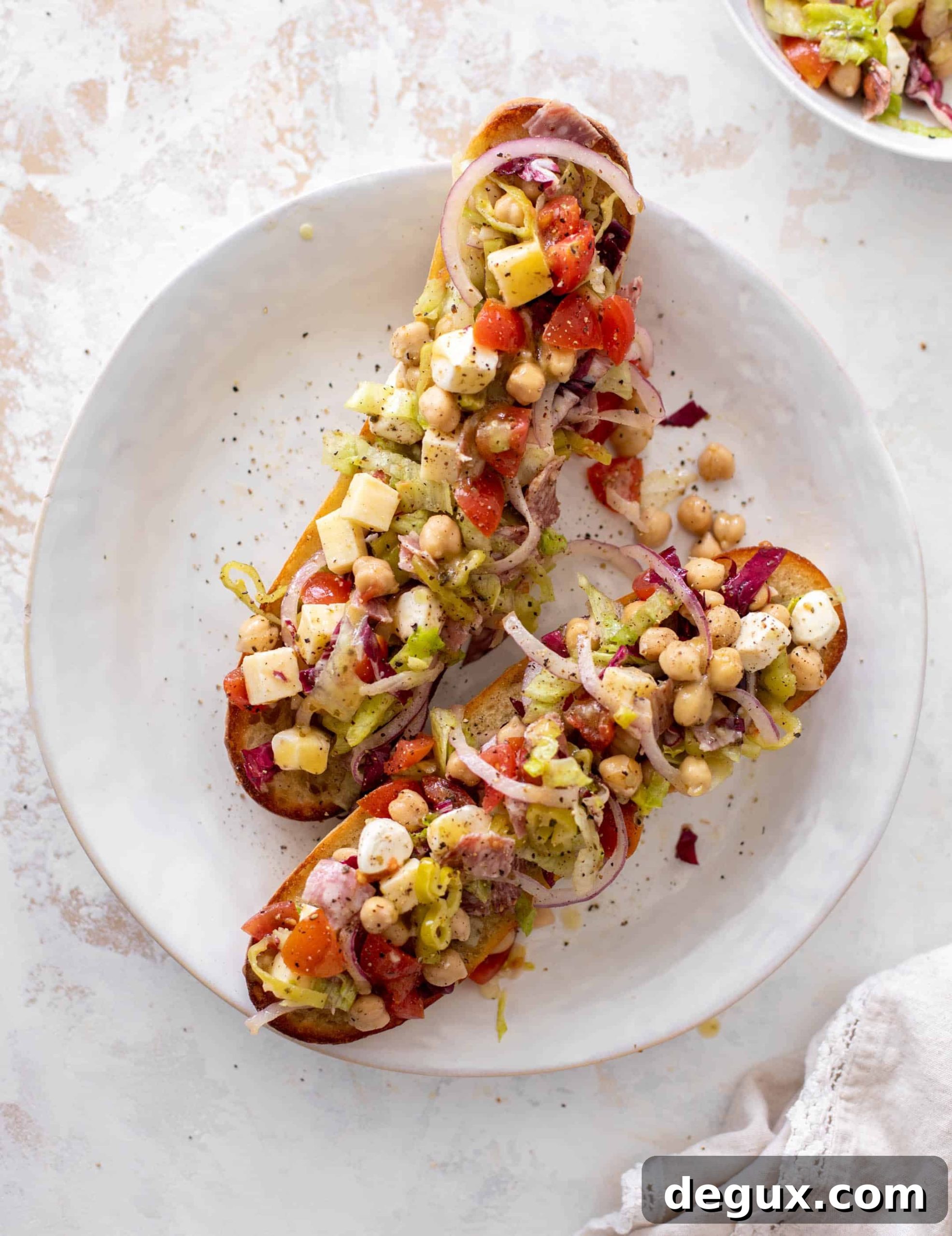 italian chopped salad on garlic bread