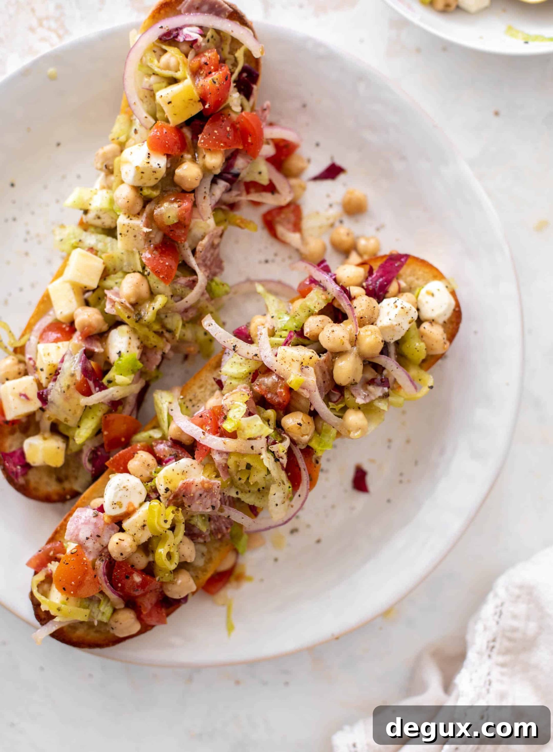 italian chopped salad on garlic bread