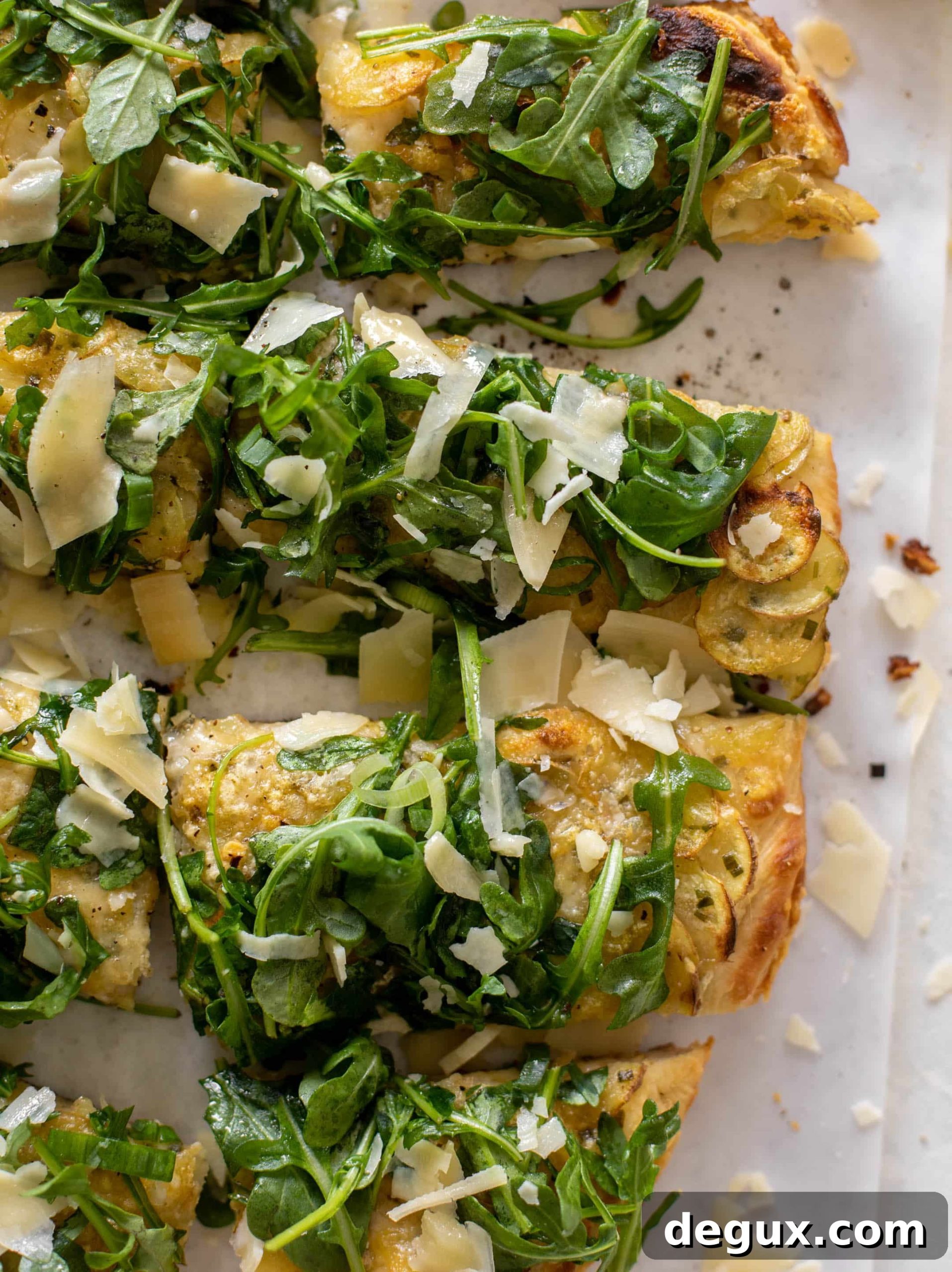 Crispy Potato and Gruyère Pizza Topped with Peppery Arugula 9 crispy potato & gruyere pizza
