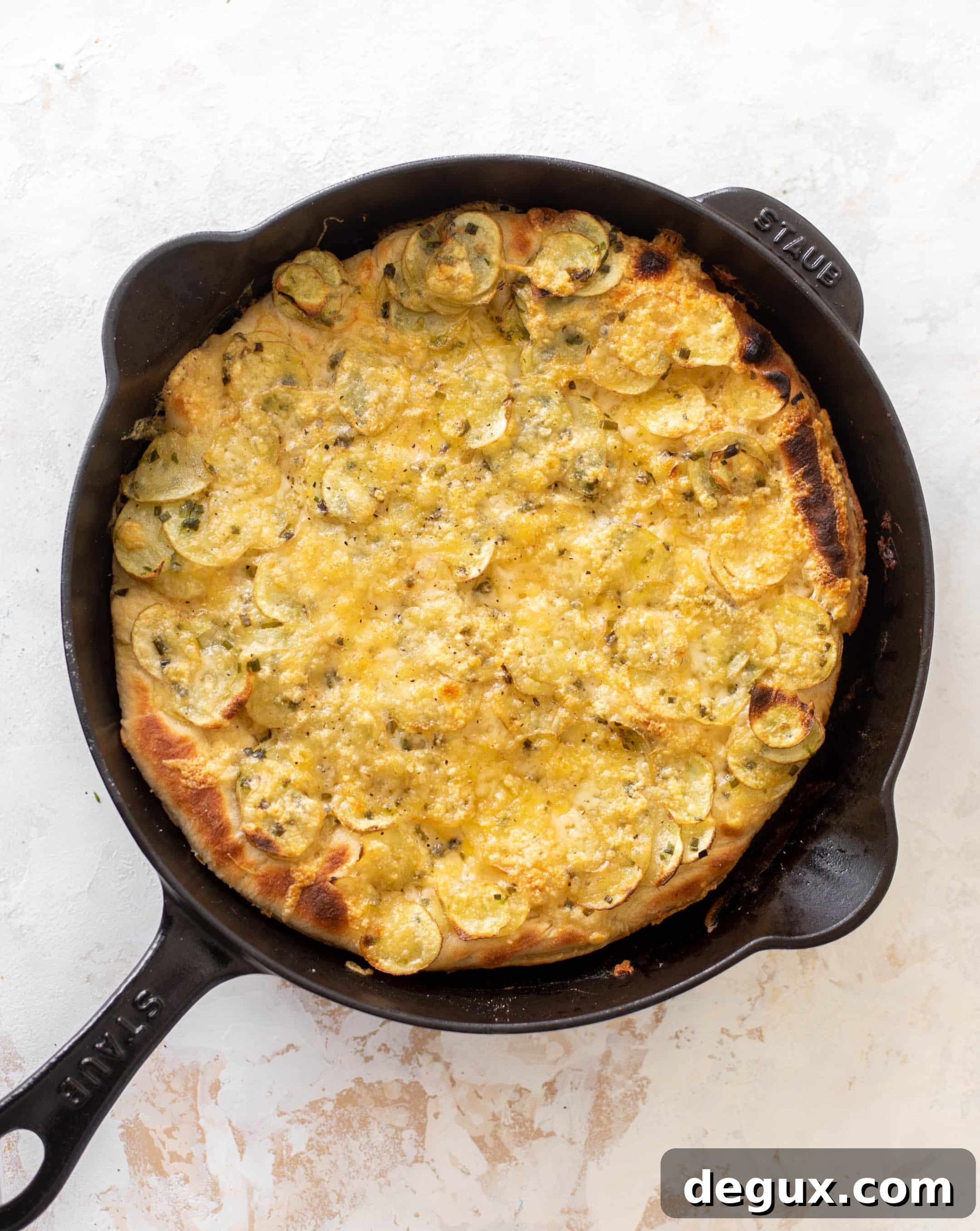 Crispy Potato and Gruyère Pizza Topped with Peppery Arugula 7 crispy potato & gruyere pizza