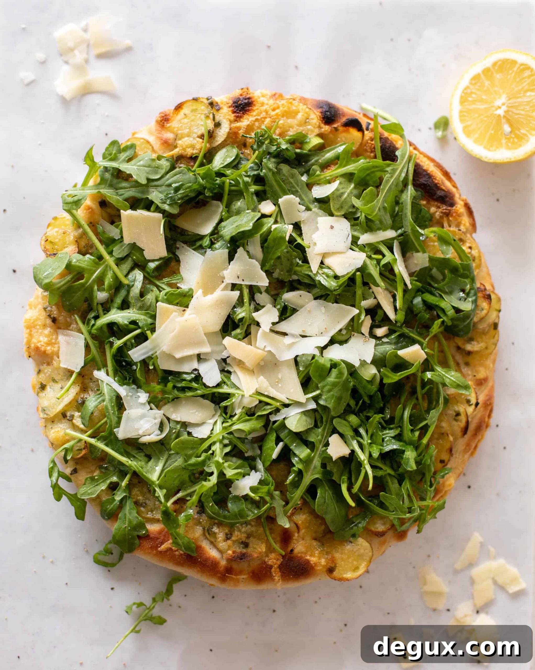 Crispy Potato and Gruyère Pizza Topped with Peppery Arugula 5 crispy potato & gruyere pizza