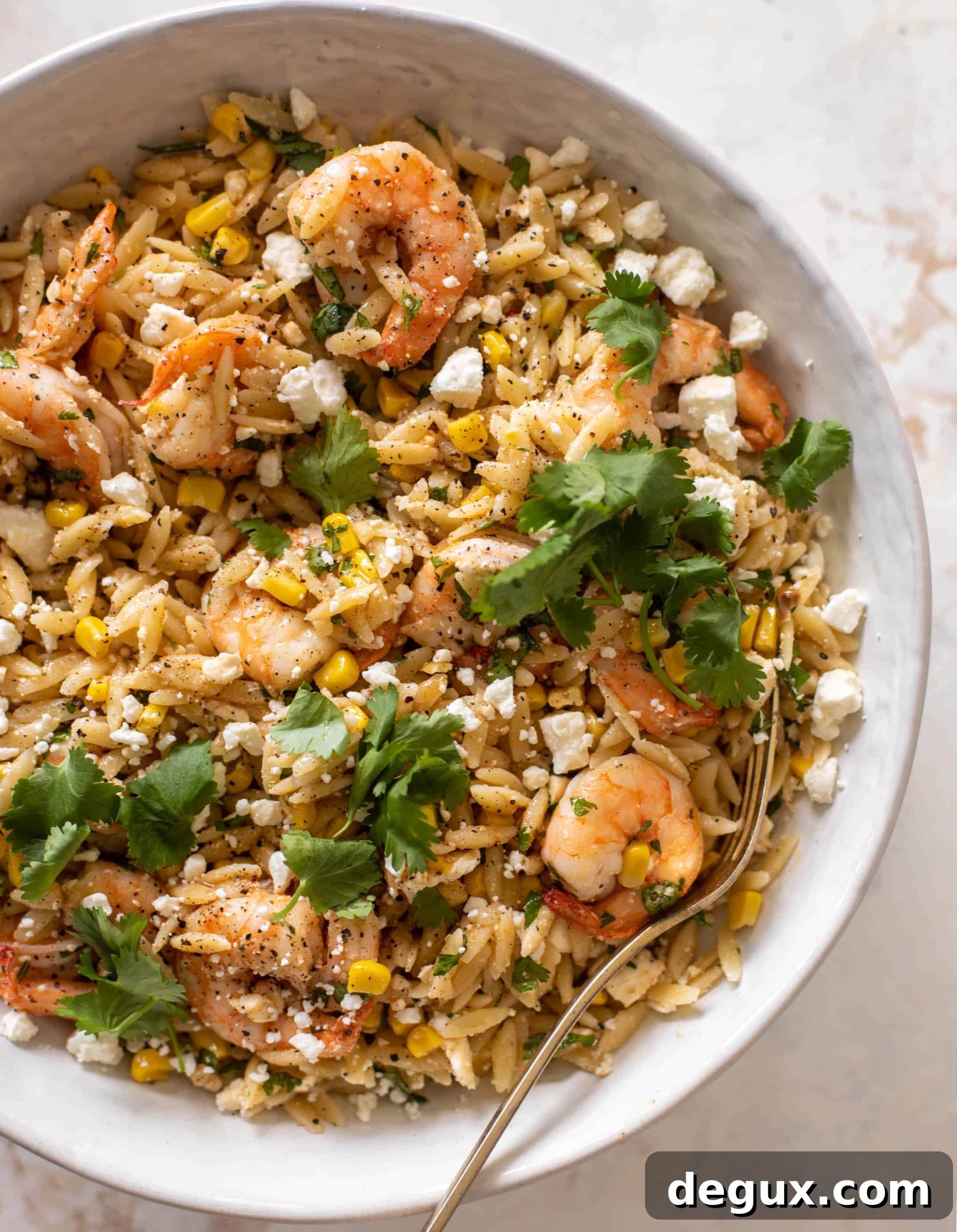 Grilled Shrimp with Corn and Feta Orzo Bowl 8 grilled shrimp, corn & feta orzo