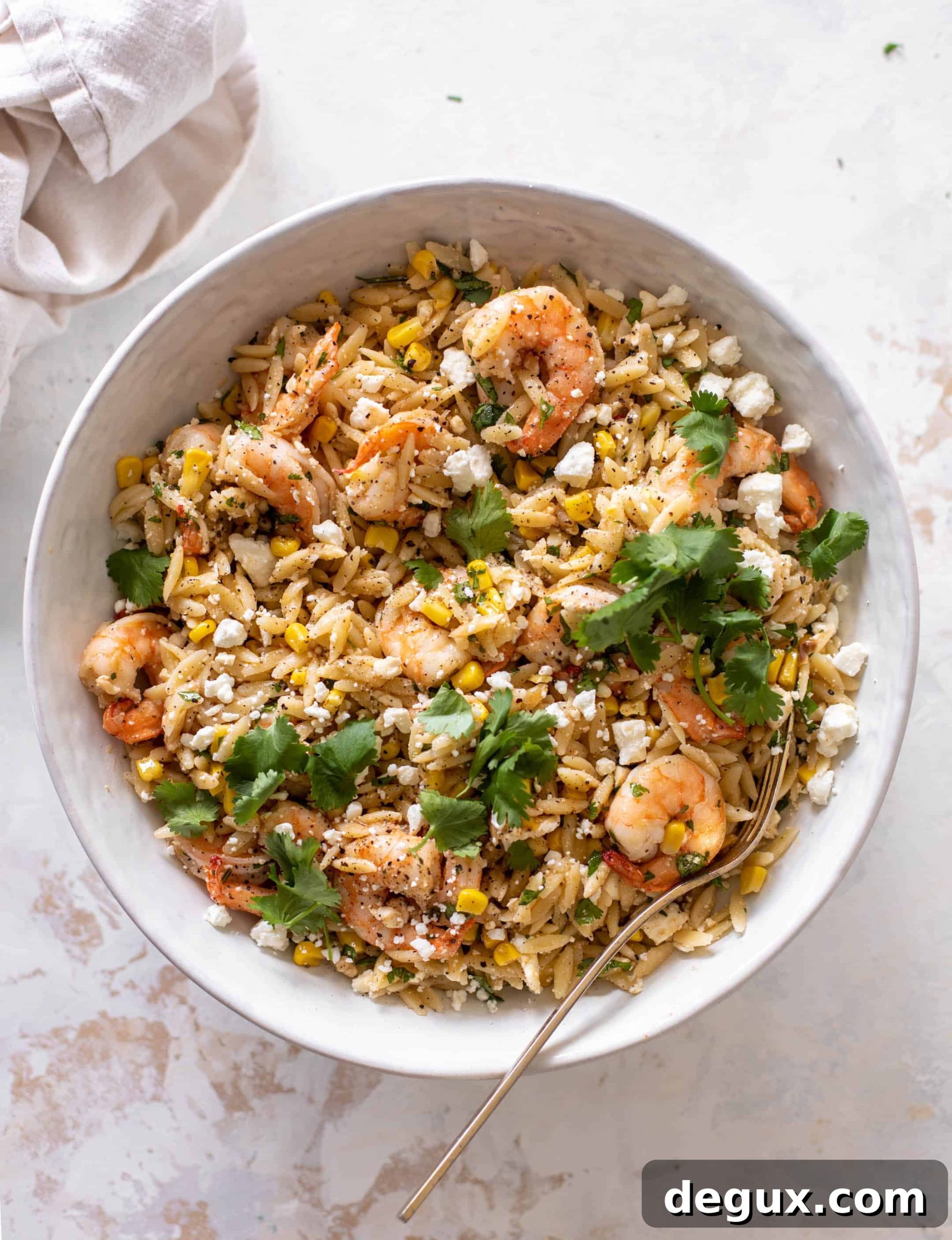 Grilled Shrimp with Corn and Feta Orzo Bowl 10 grilled shrimp, corn & feta orzo