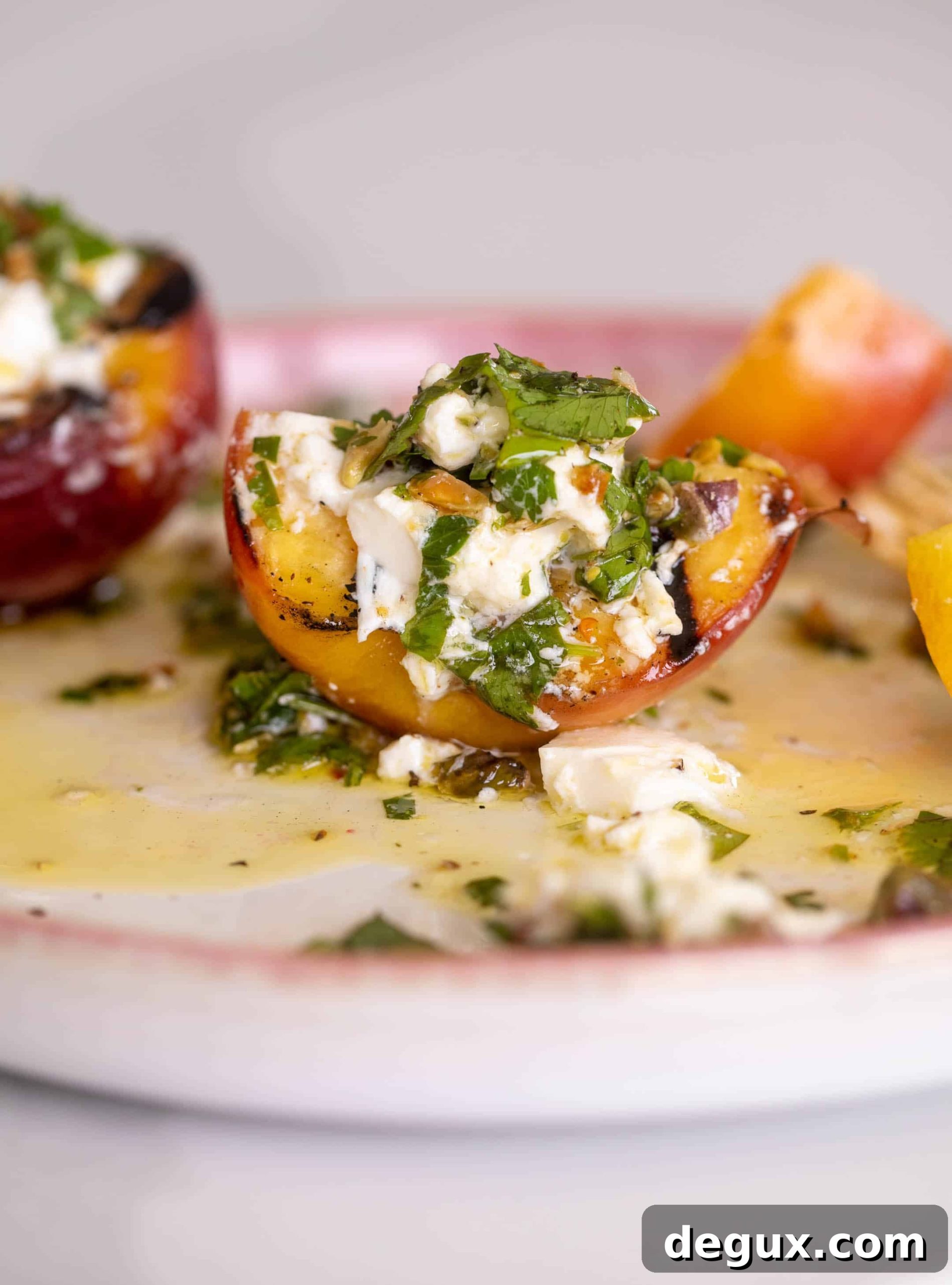grilled peaches with burrata and pistachio vinaigrette
