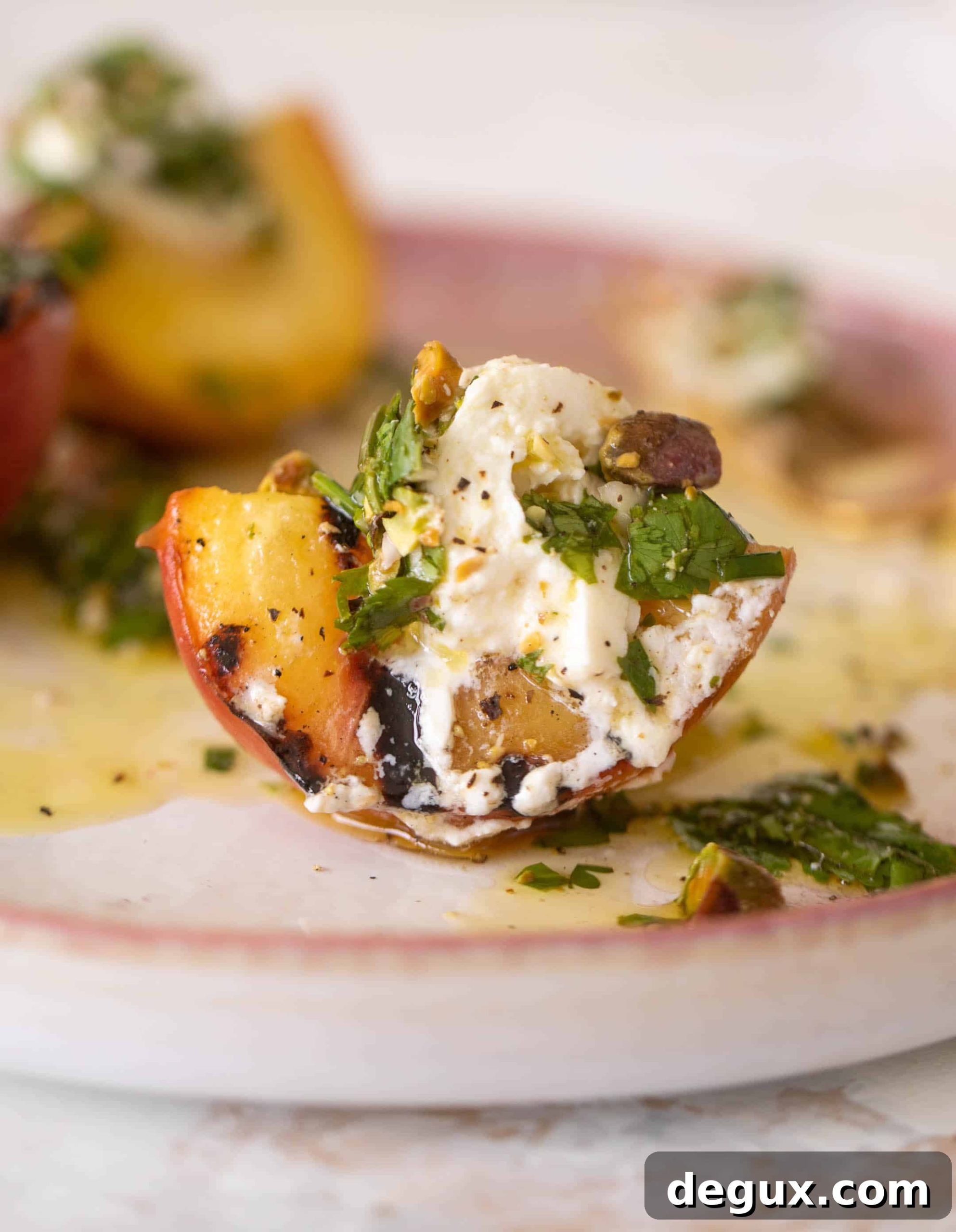 Grilled Peaches with Burrata and Pistachio-Herb Vinaigrette 9 grilled peaches with burrata and pistachio vinaigrette