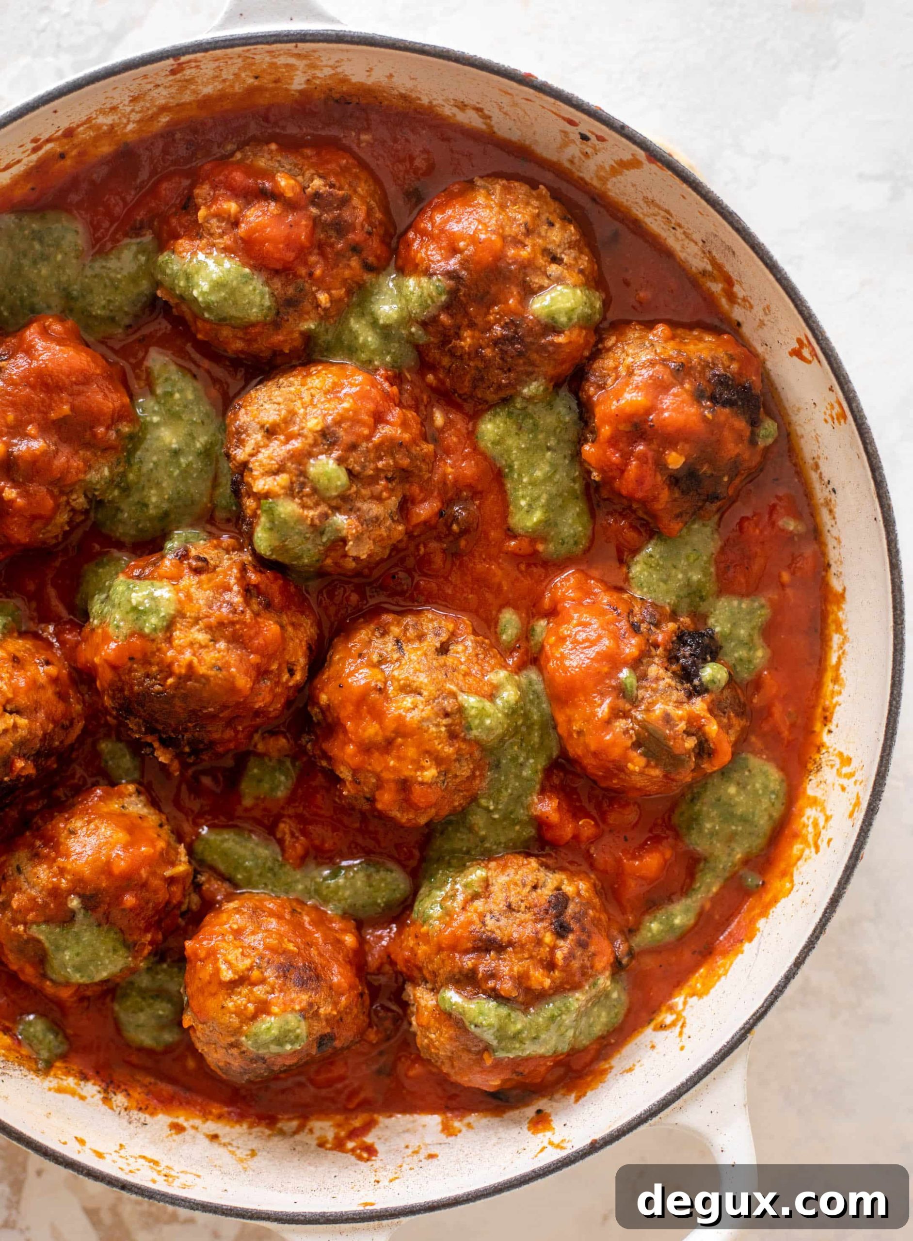 Baked Pesto Meatballs with Burrata and Melted Cheese 5 cheesy baked pesto meatballs with burrata