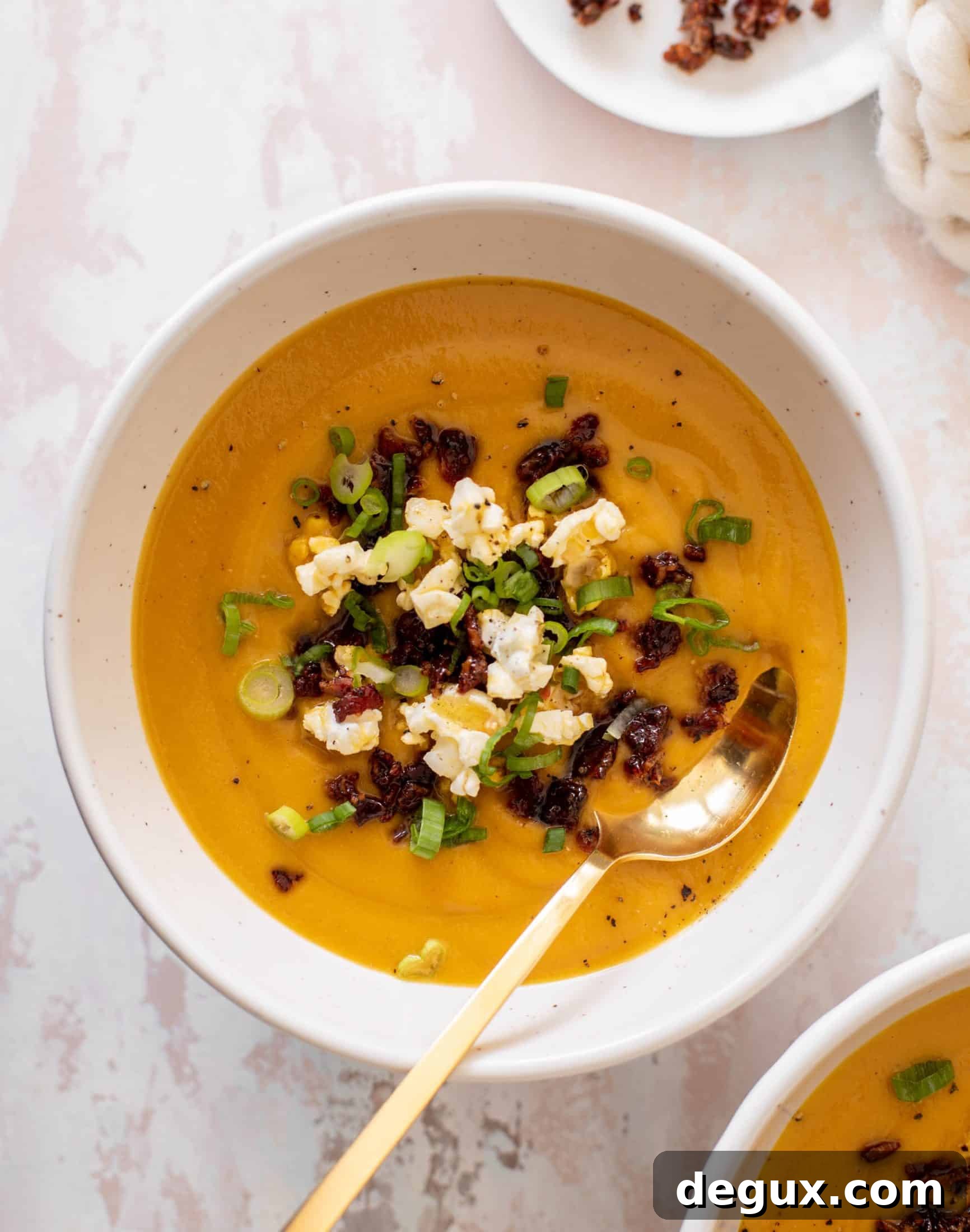 honeynut squash soup with buttered popcorn