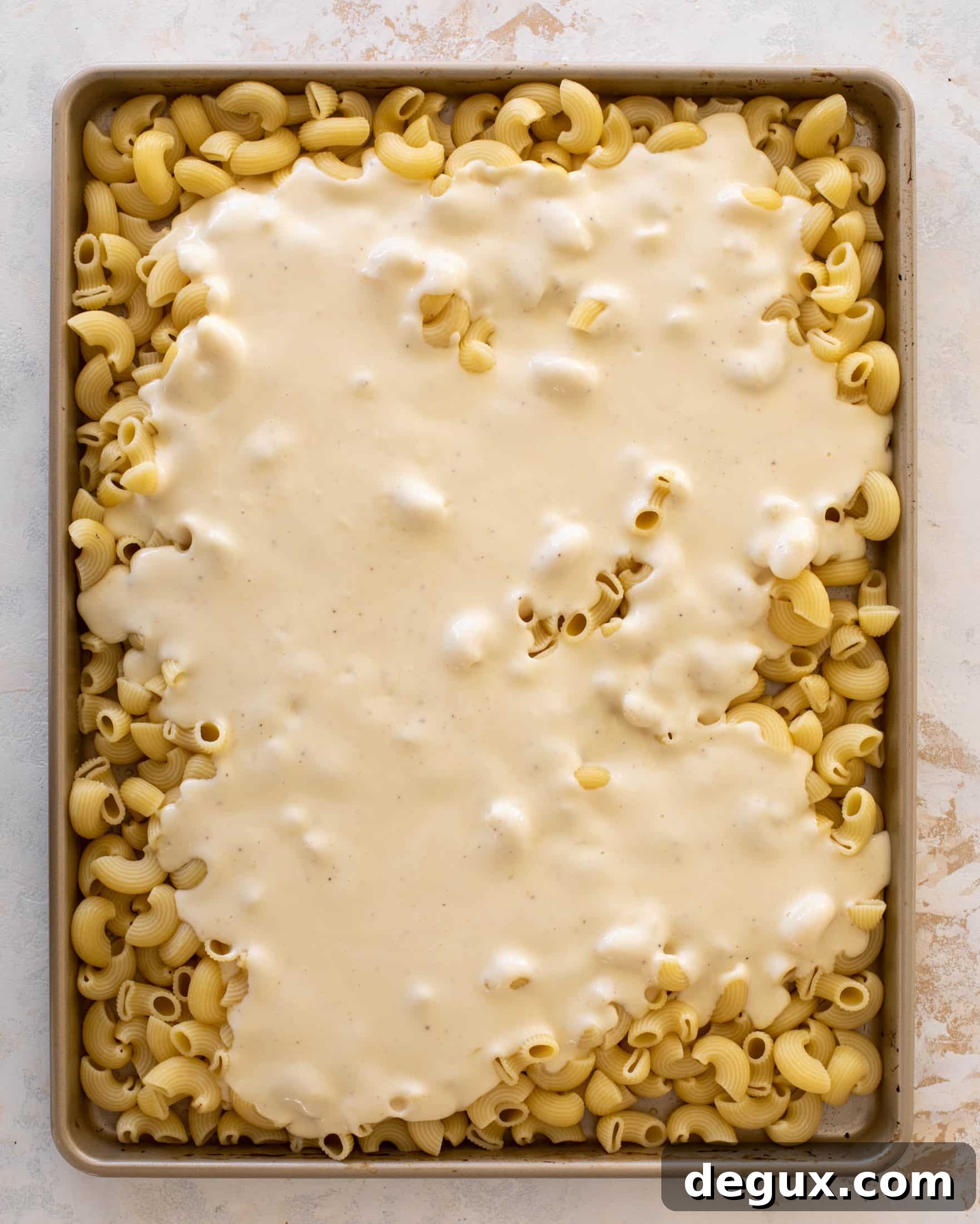 Sheet Pan Macaroni and Cheese Recipe for Crowd-Friendly Baking 5 sheet pan mac and cheese