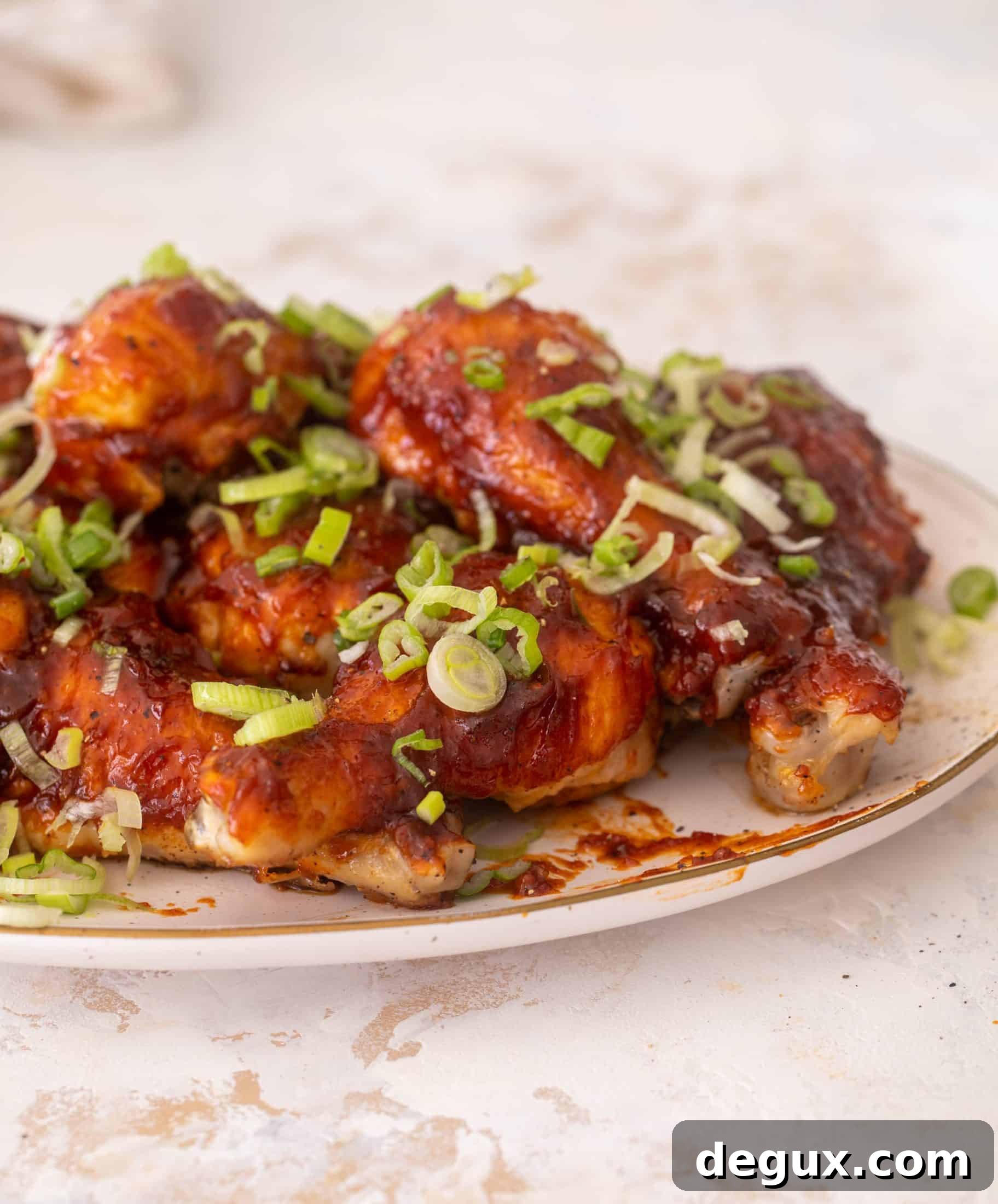 Oven-Baked BBQ Chicken Drumsticks with Sticky Glaze 11 baked BBQ chicken drumsticks