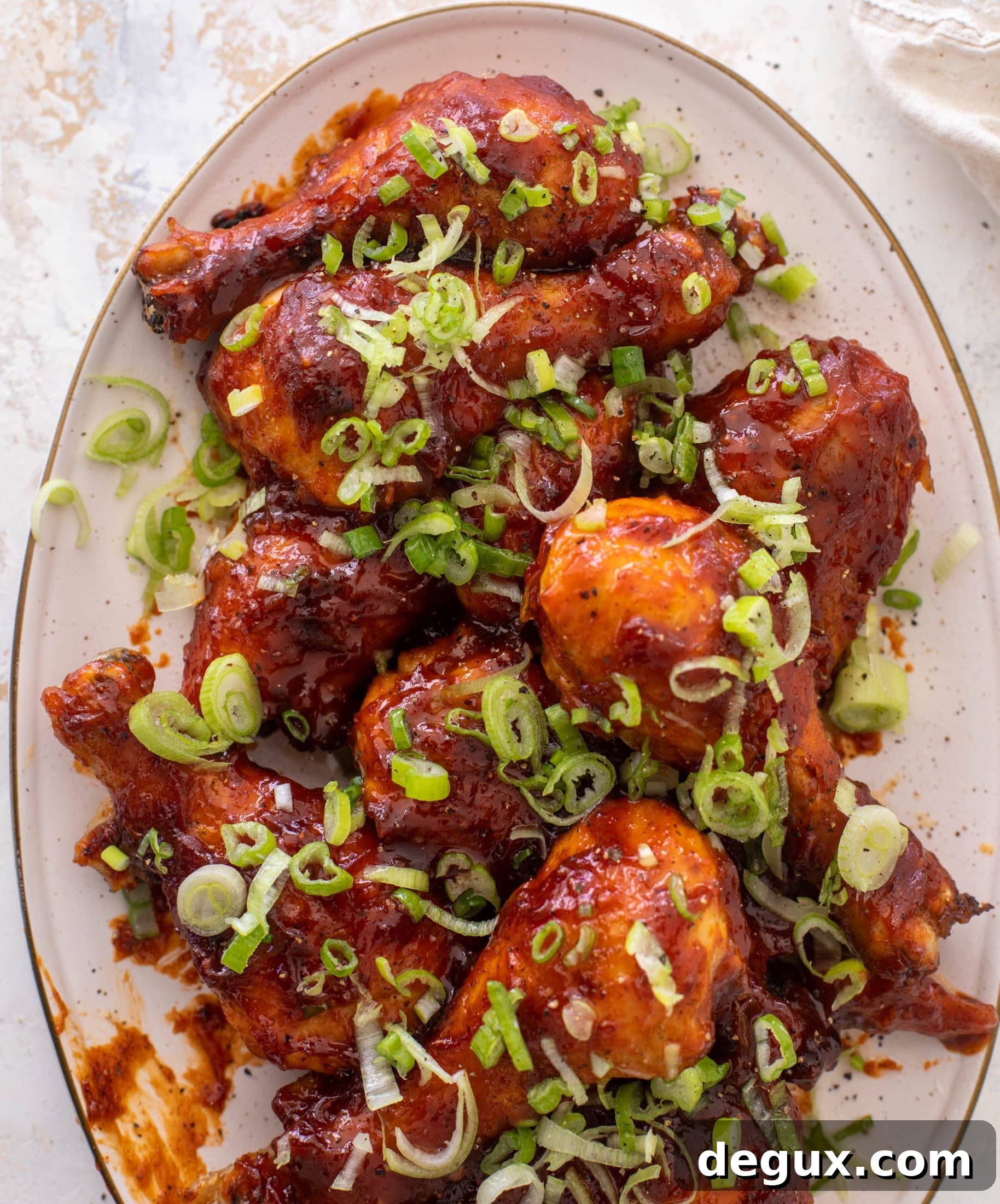 Oven-Baked BBQ Chicken Drumsticks with Sticky Glaze 8 baked BBQ chicken drumsticks
