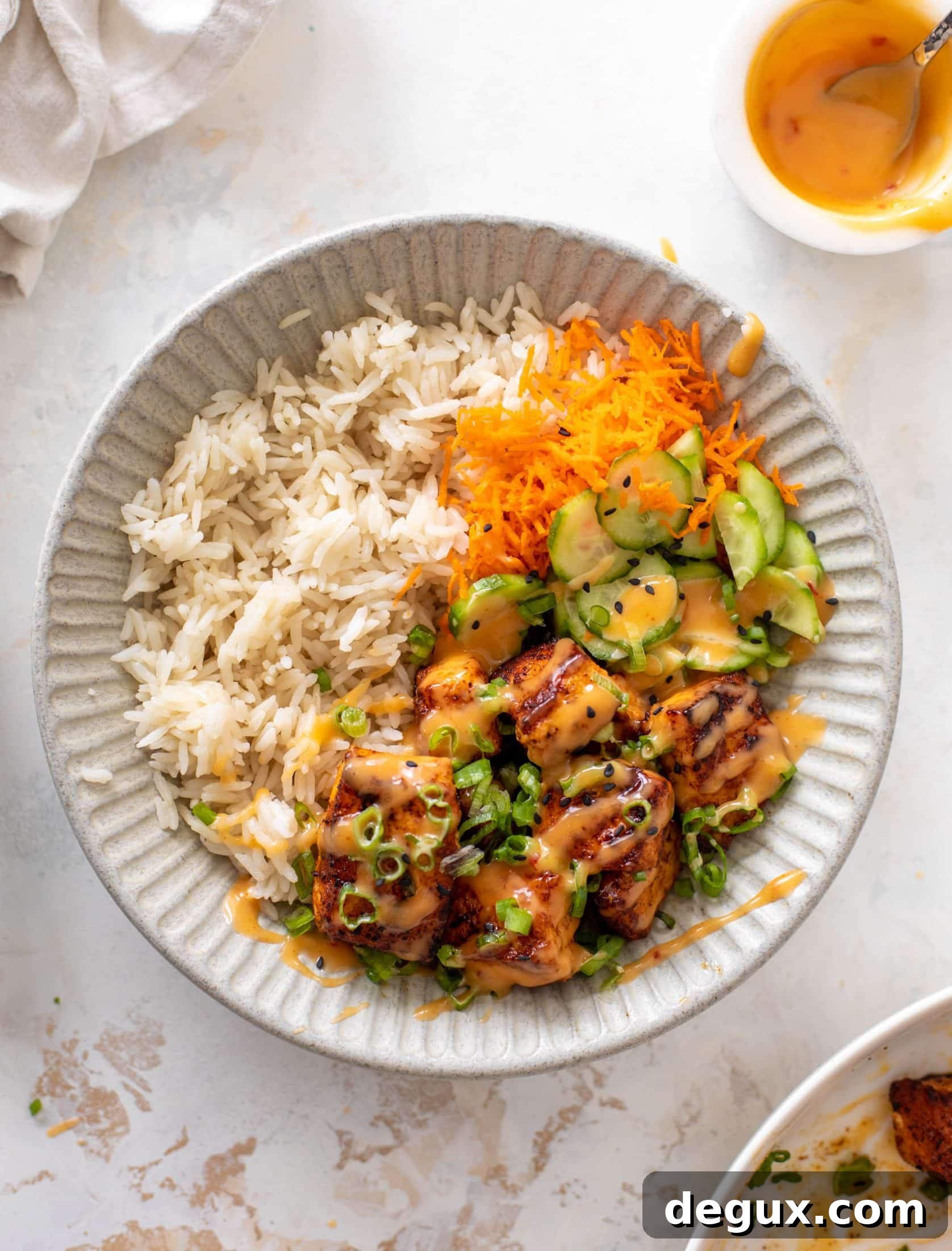 Bang Bang Salmon Rice Bowl Recipe: Spicy Creamy Salmon Bowl 9 bang bang salmon bowls