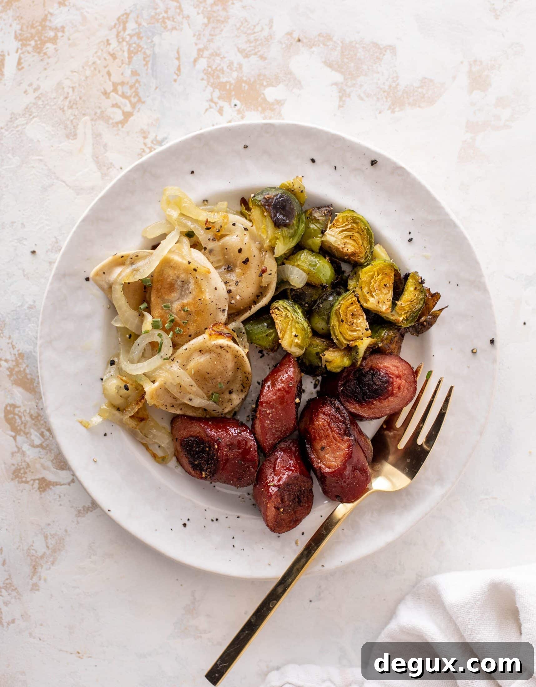 sheet pan pierogi, sausage and brussels sprouts