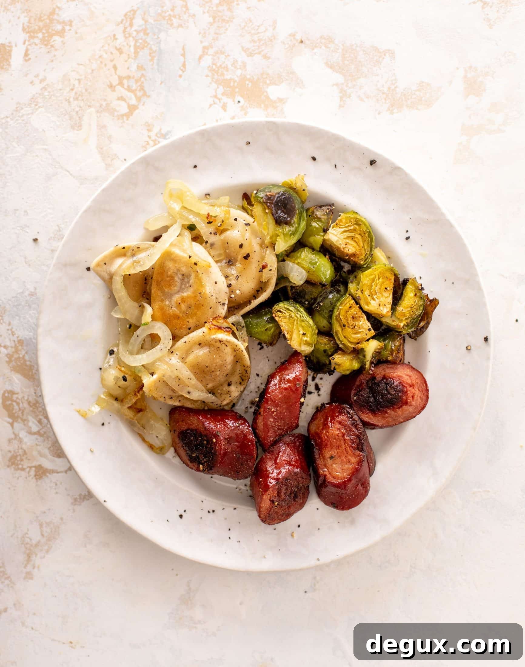 sheet pan pierogi, smoked sausage and brussels sprouts