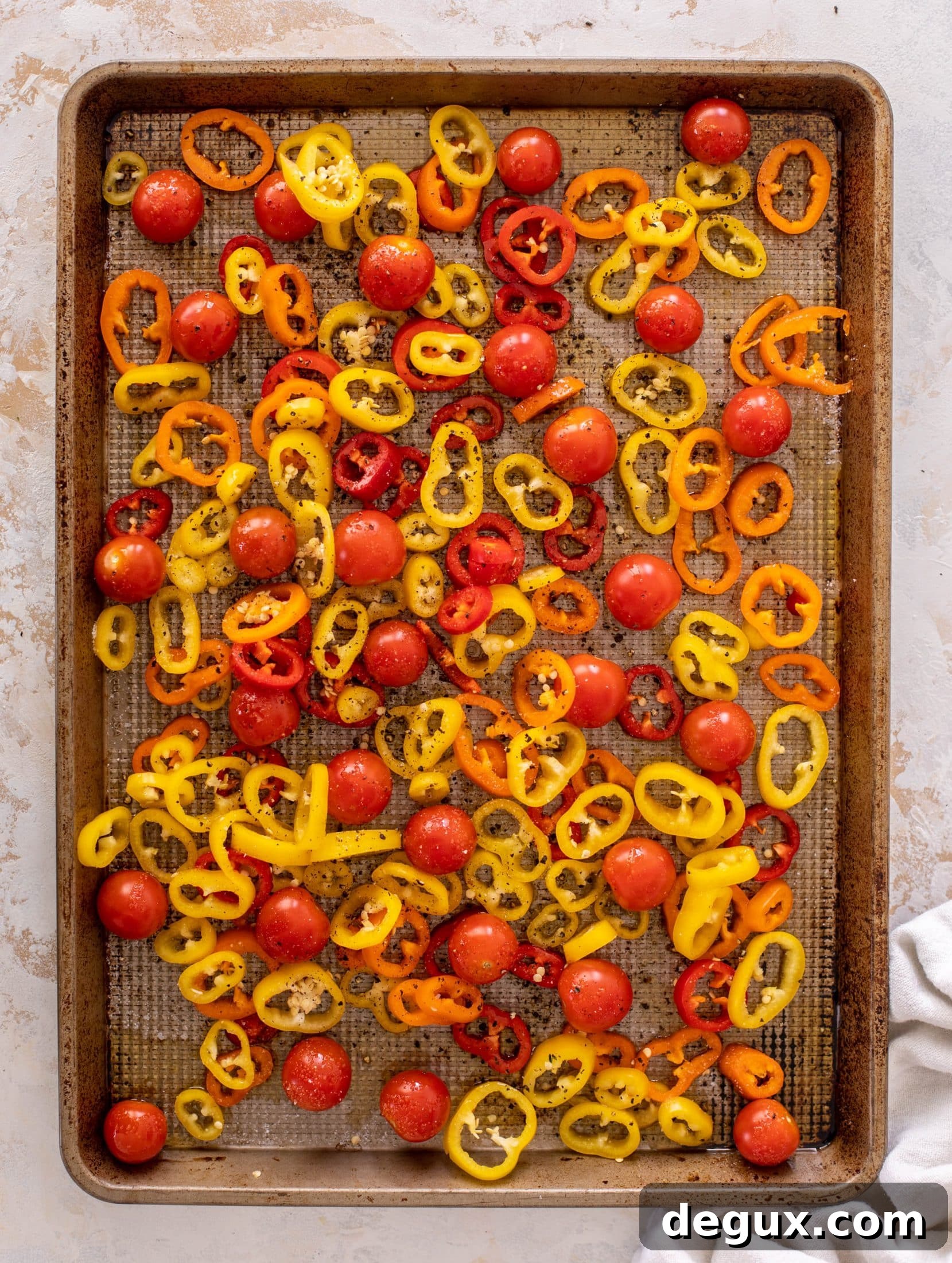 sheet pan chicken meatballs with tomatoes and feta
