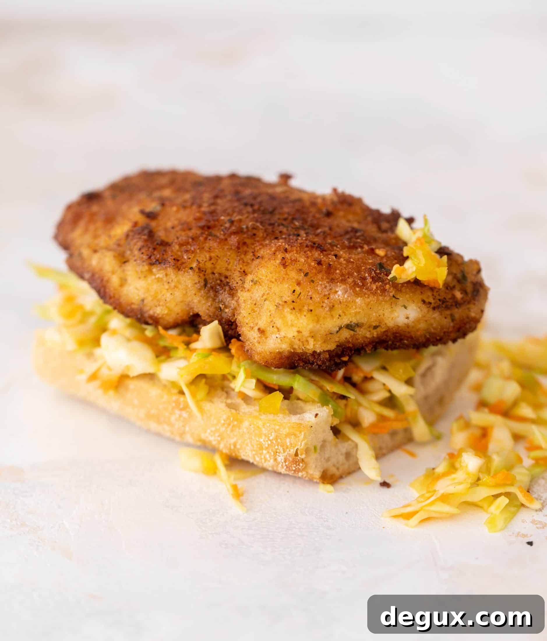 Crispy Fish Sandwich with Tangy Banana Pepper Slaw 7 crispy fish sandwiches with chopped slaw