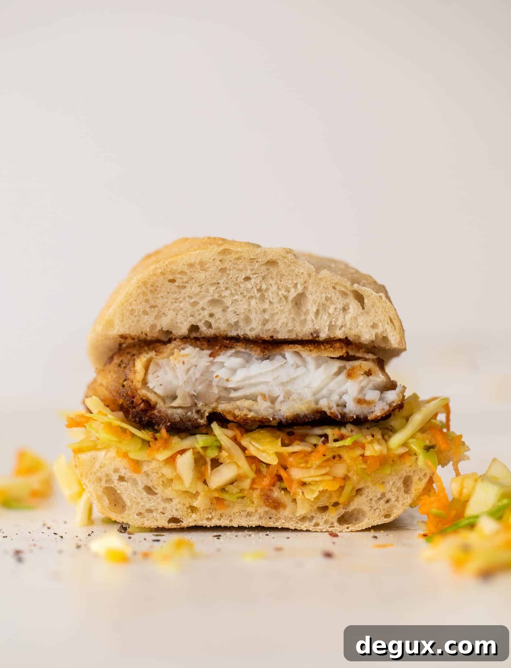 Crispy Fish Sandwich with Tangy Banana Pepper Slaw 8 crispy fish sandwiches with chopped slaw