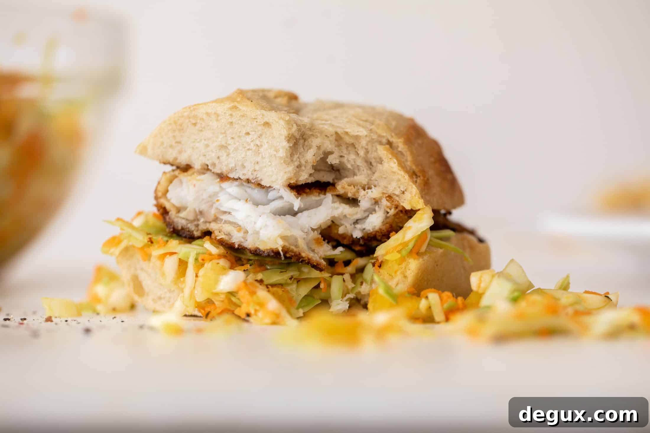 Crispy Fish Sandwich with Tangy Banana Pepper Slaw 9 crispy fish sandwiches with chopped slaw