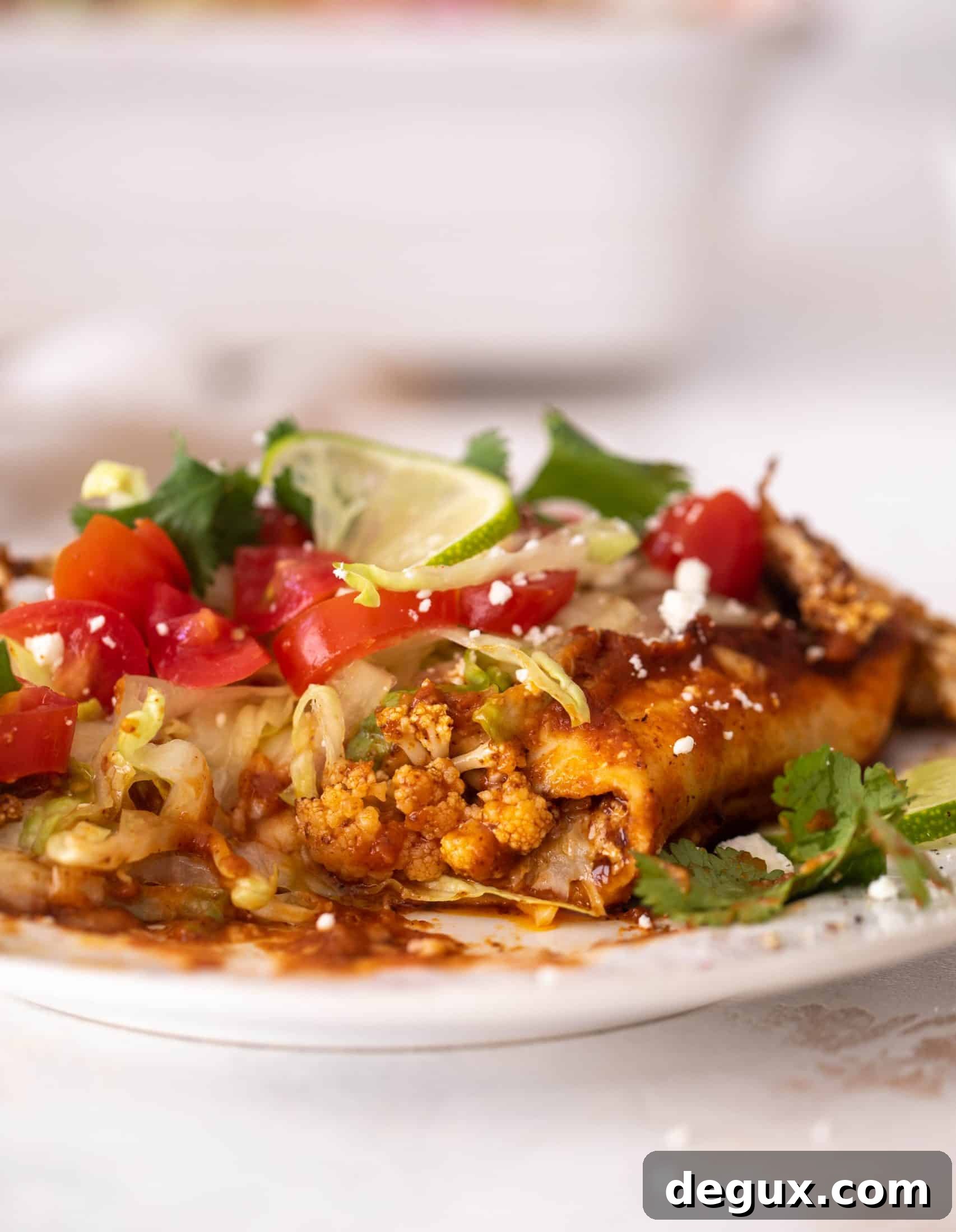chipotle cheddar cauliflower enchiladas