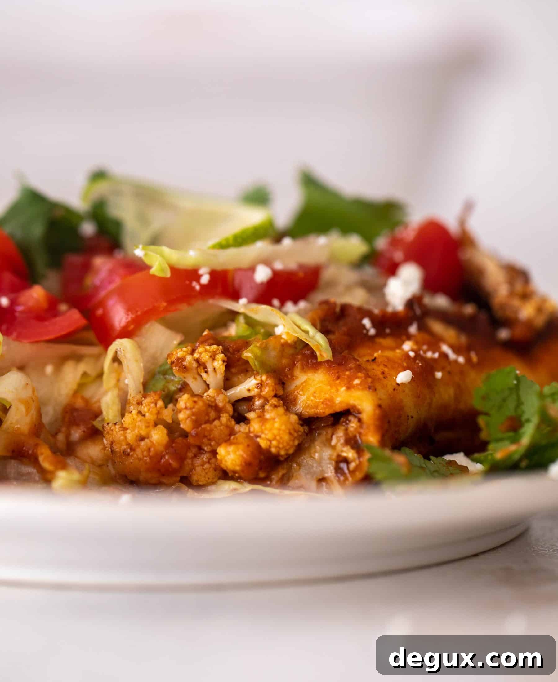 chipotle cheddar cauliflower enchiladas