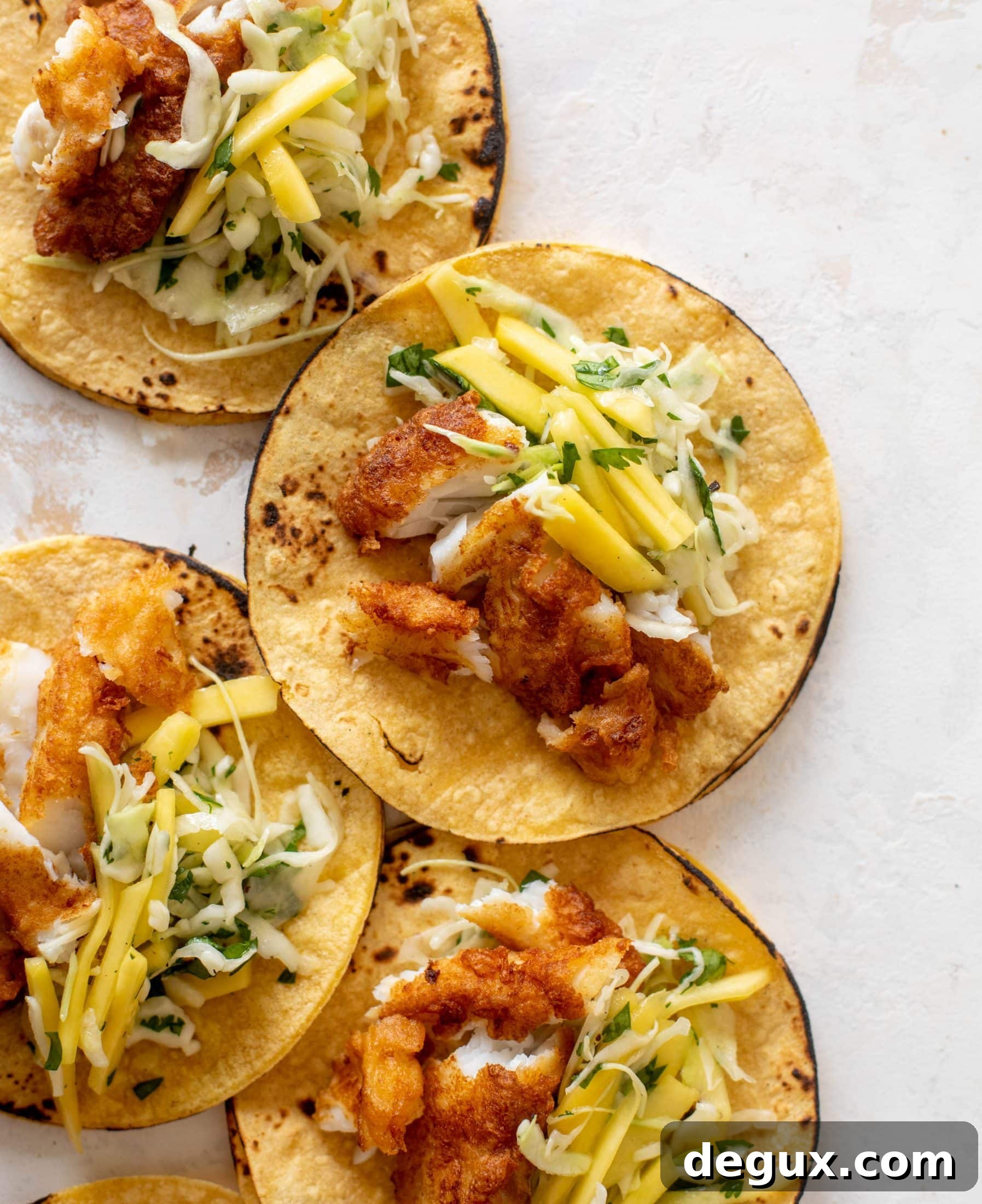 Crispy Fish Tacos with Fresh Mango Slaw Recipe 6 crispy fish tacos with mango slaw