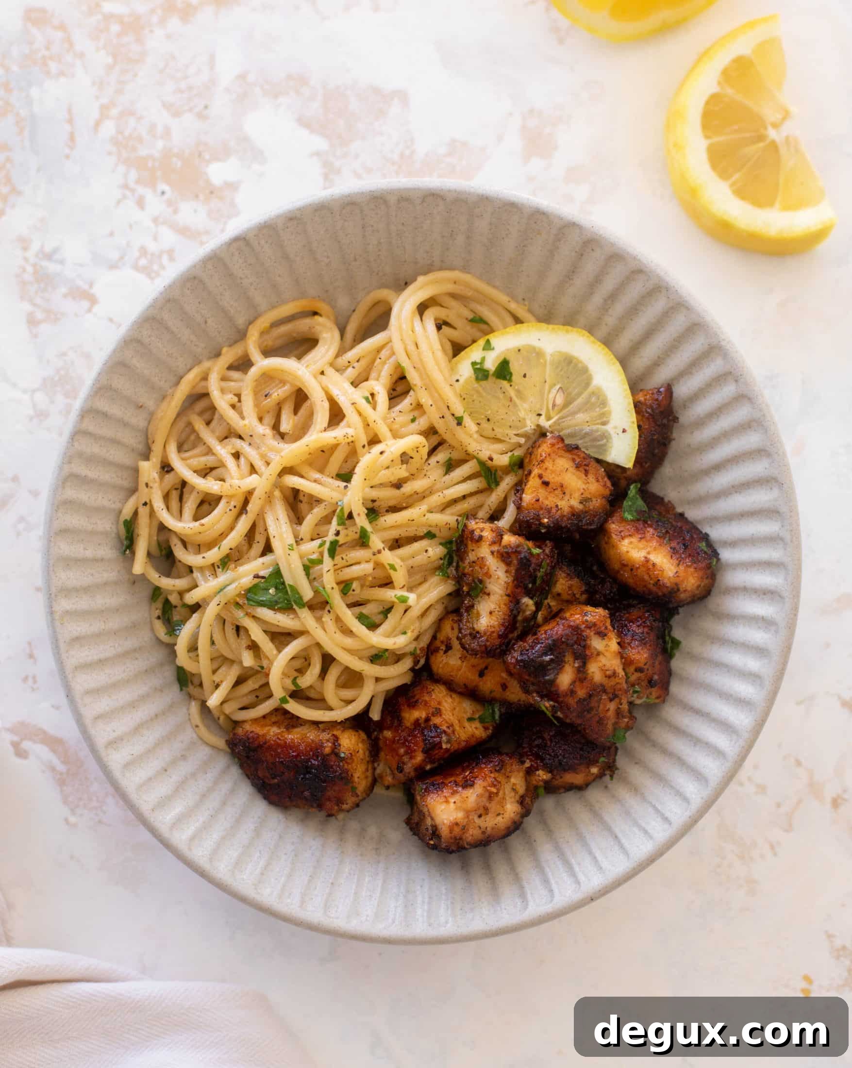 crispy lemon chicken bites and spaghetti
