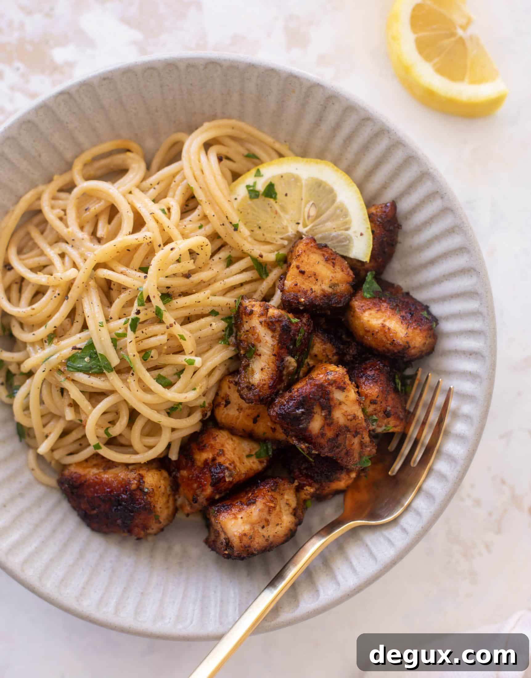 crispy lemon chicken bites and spaghetti