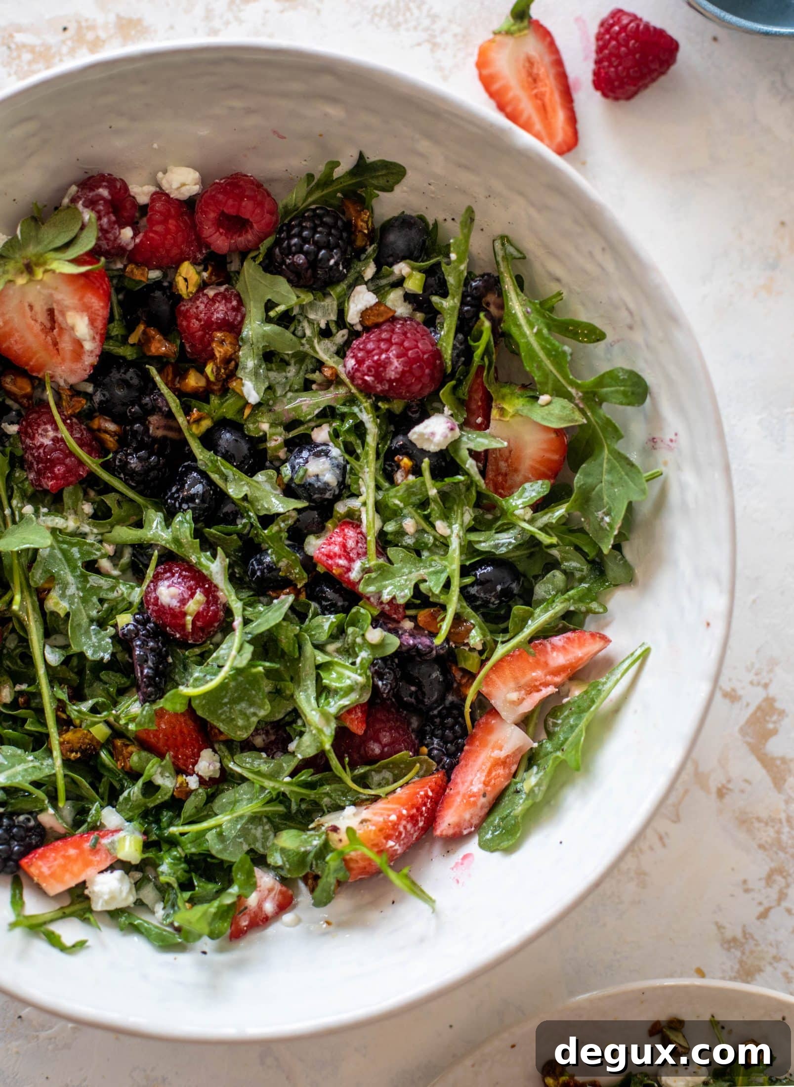 red white and berry arugula salad