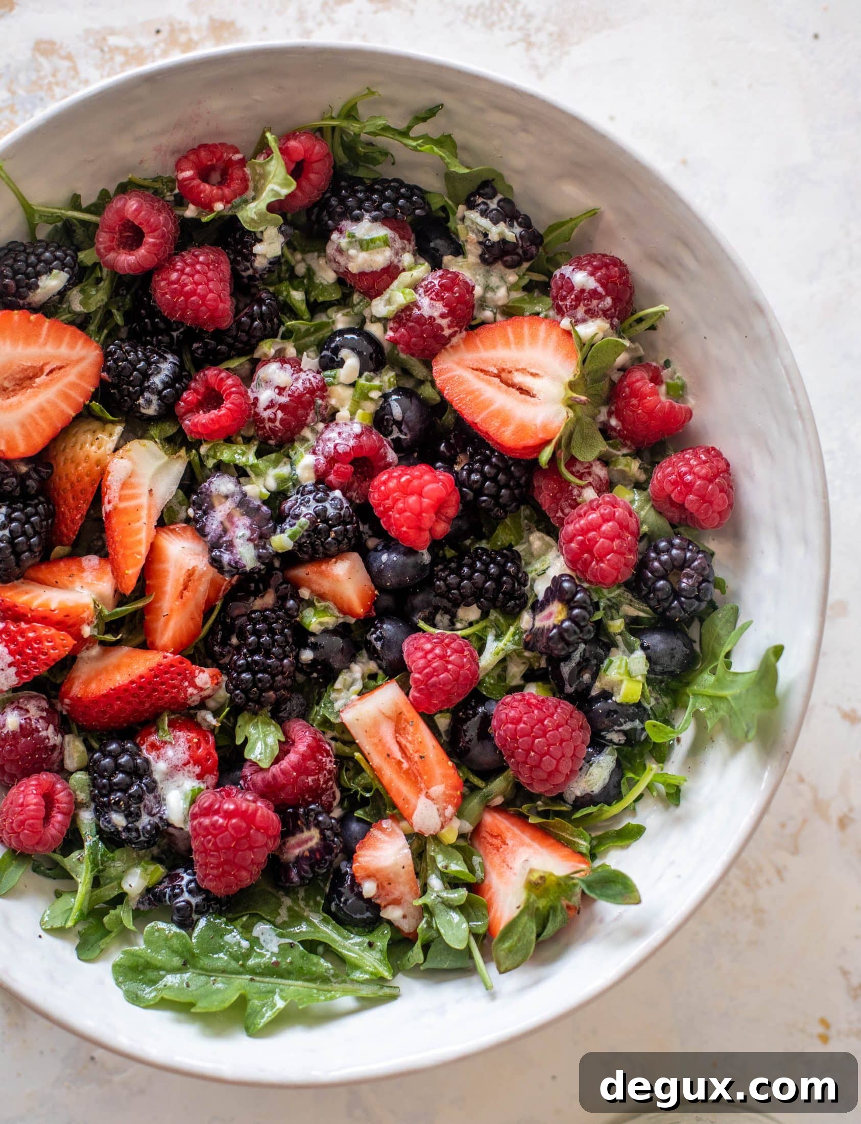 red white and berry arugula salad