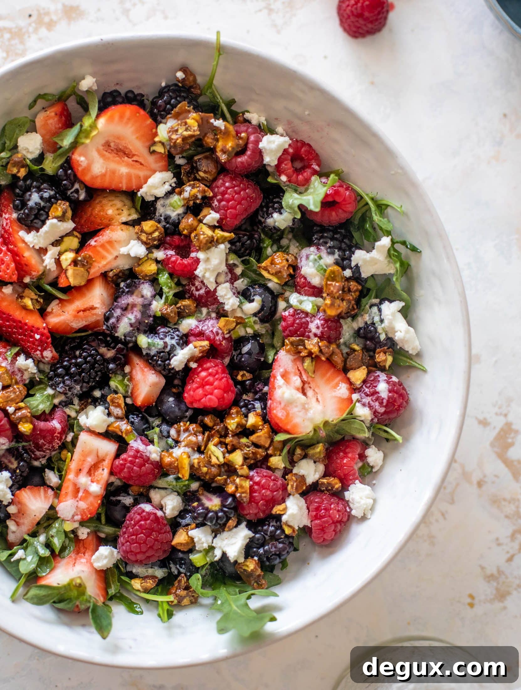 red white and berry arugula salad