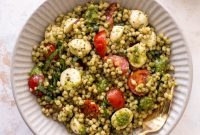 Pesto Caprese Couscous with Cherry Tomatoes & Mozzarella