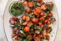 Grilled Steak with Spicy Marinated Tomatoes and Chimichurri