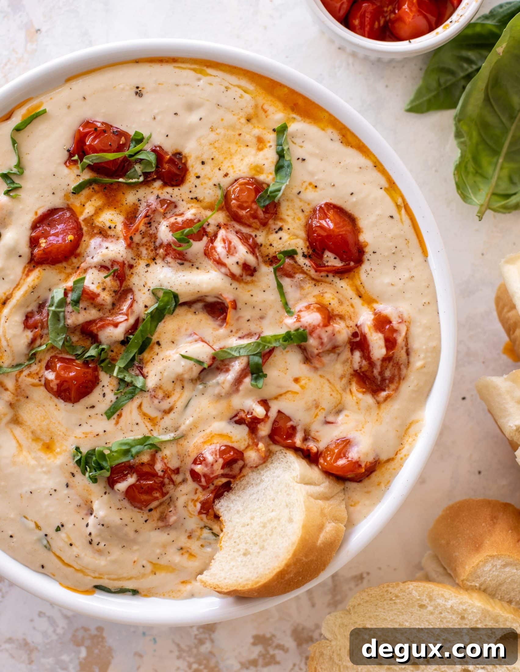 white bean dip with burst tomatoes