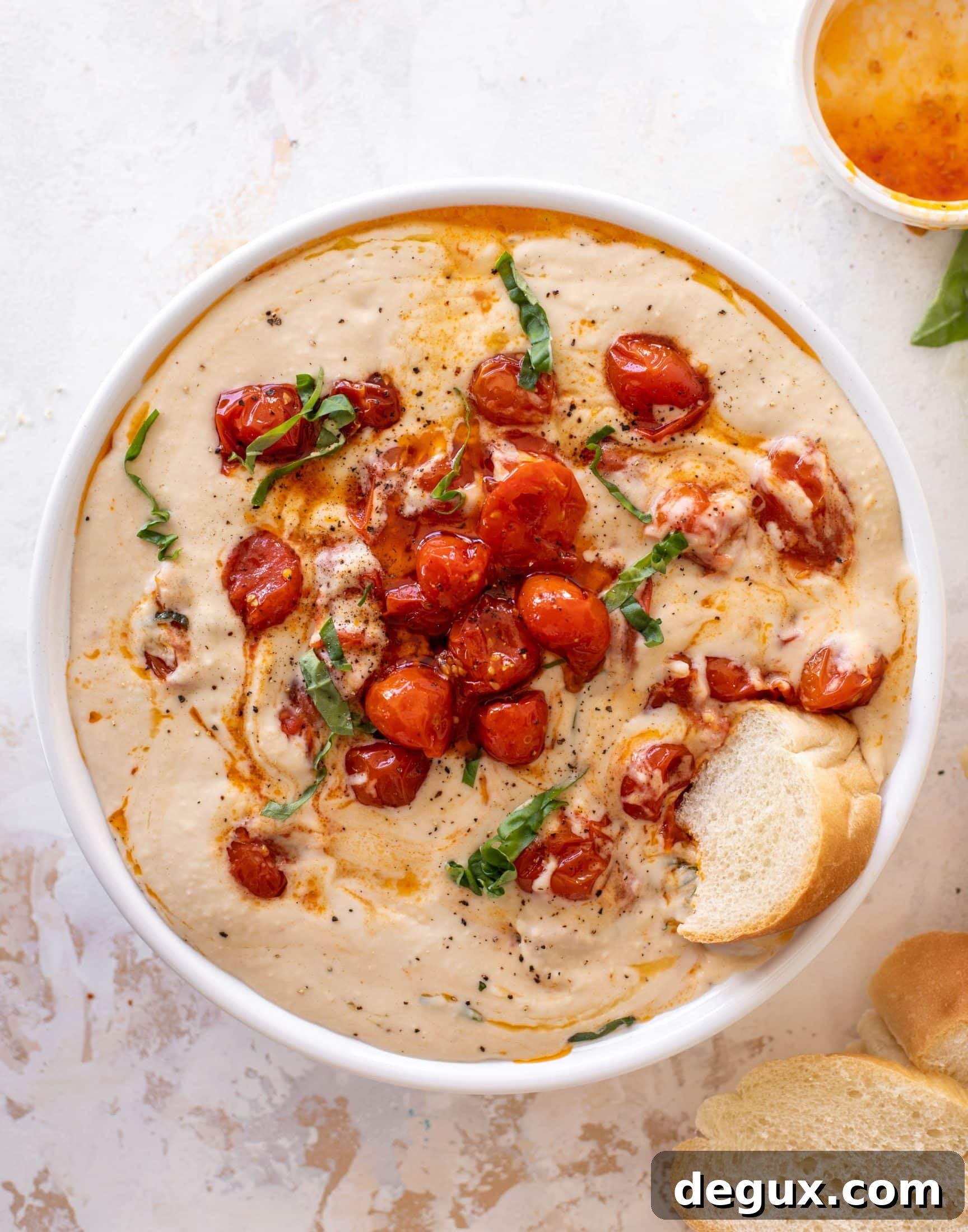 white bean dip with burst tomatoes